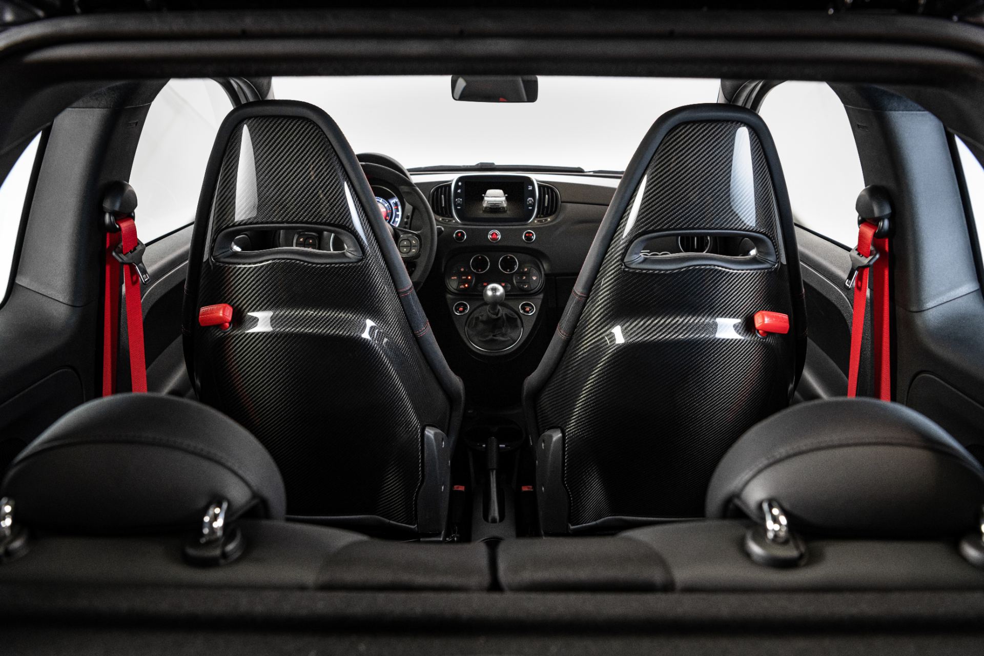 2021 abarth 595 interior front seats rear view