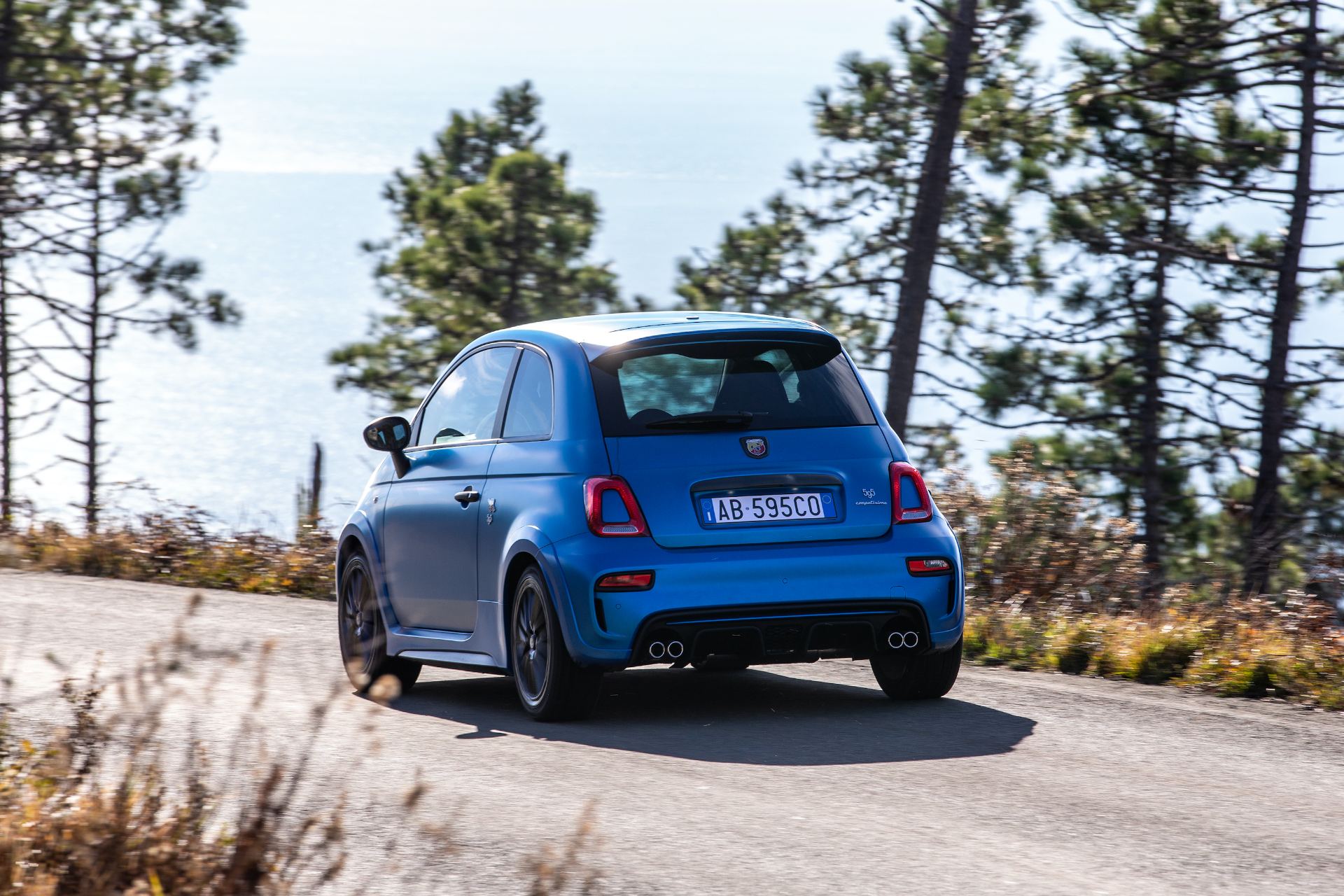 2021 abarth 595 rear three quarter blue