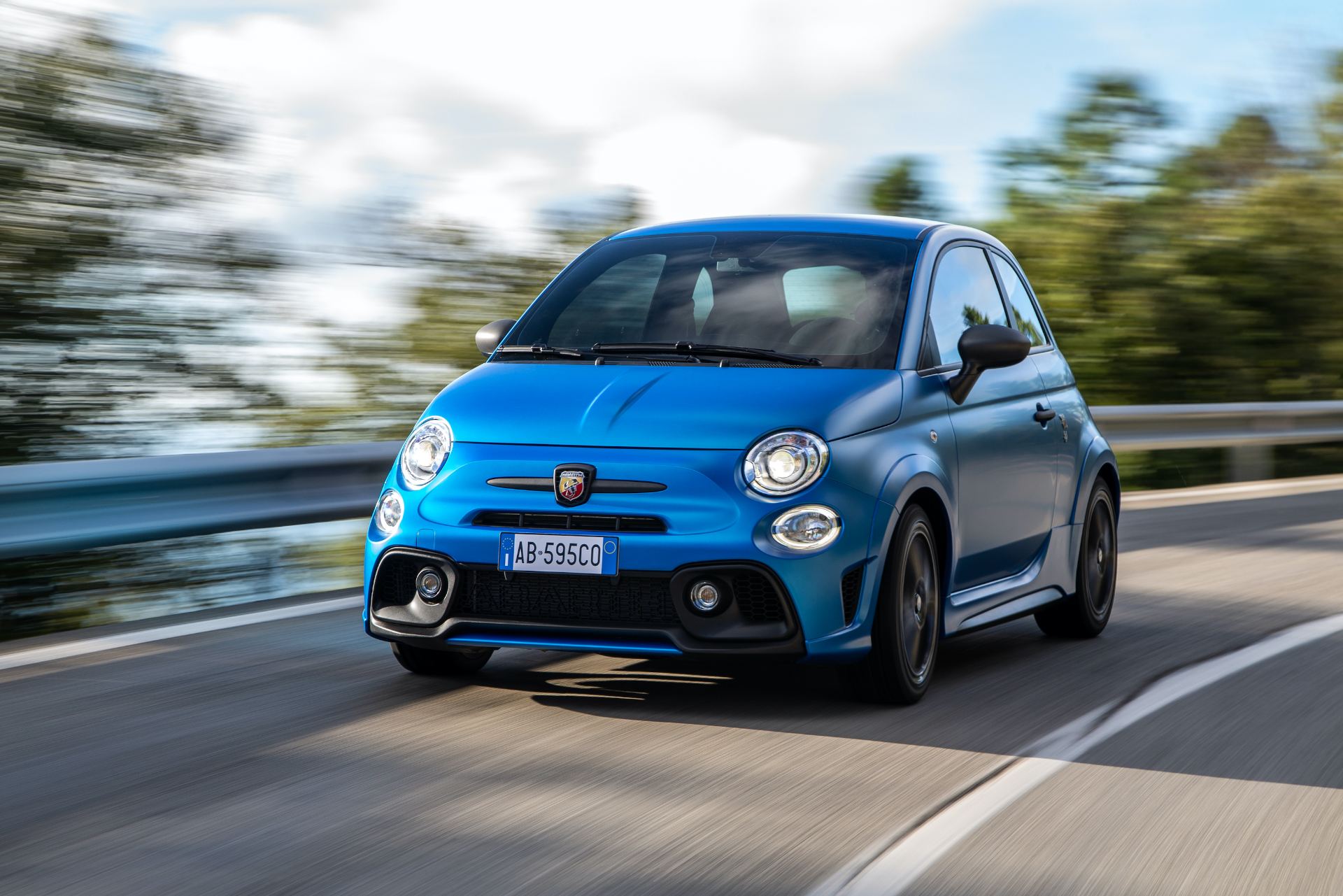 2021 abarth 595 driving front three quarter blue