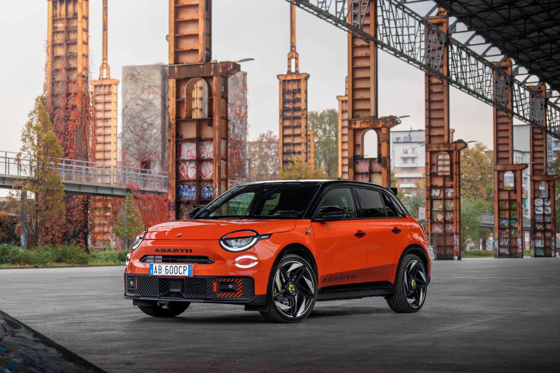 2025 abarth 600e front three quarter orange