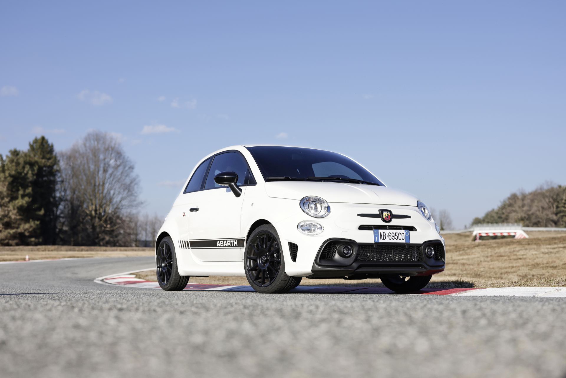 2024 abarth 695 front three quarter track white