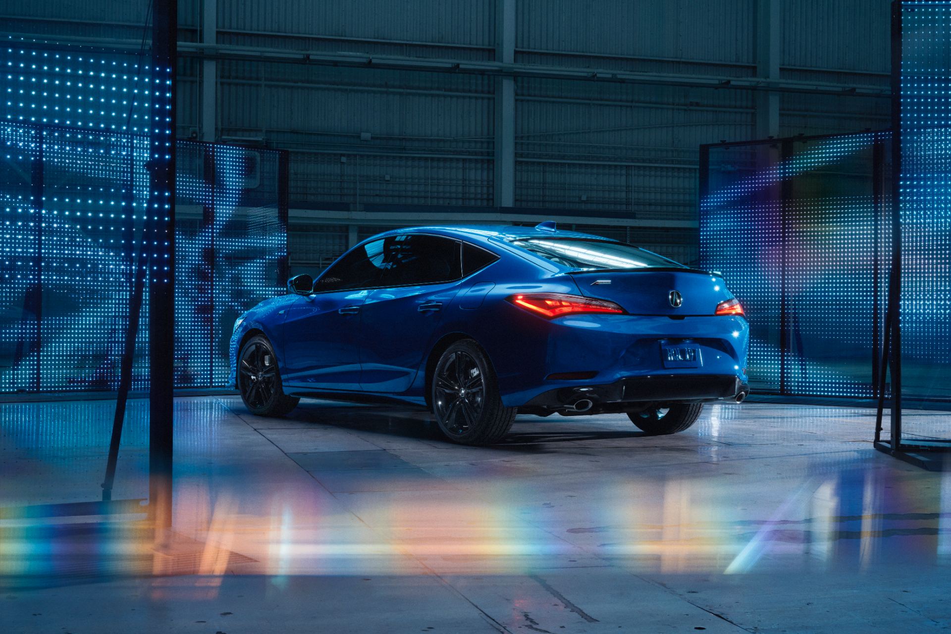 2026 acura integra a spec rear three quarter studio blue