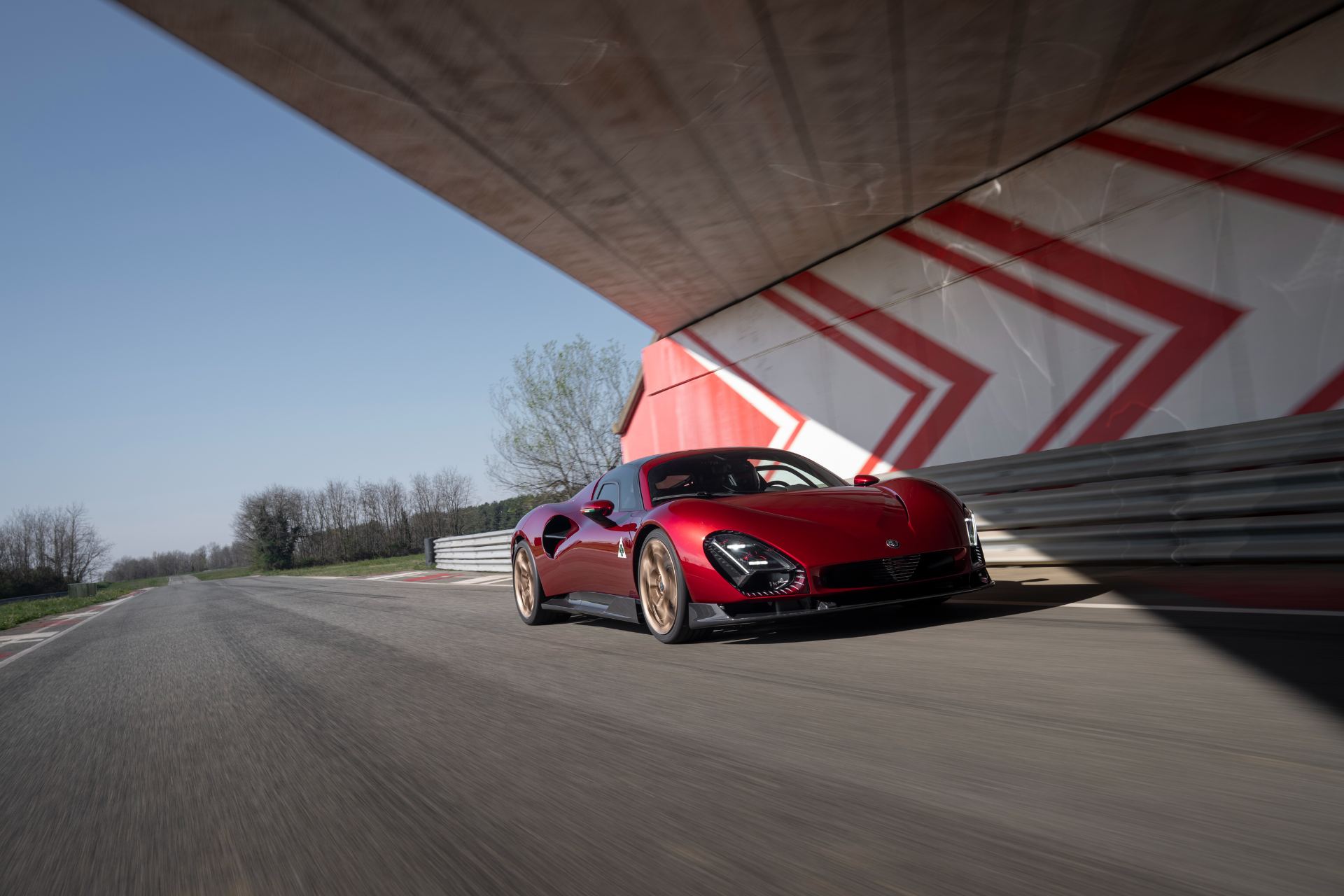 2024 alfa romeo 33 stradale driving under bridge red