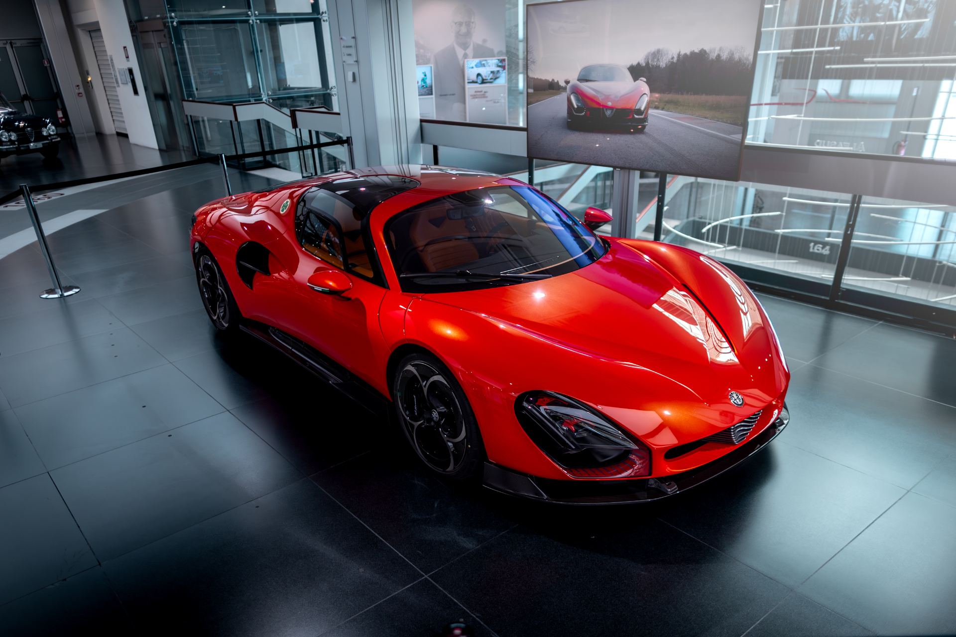 2024 alfa romeo 33 stradale front three quarter showroom red