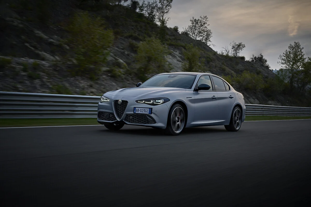 2026 alfa romeo giulia driving front three quarter track grey