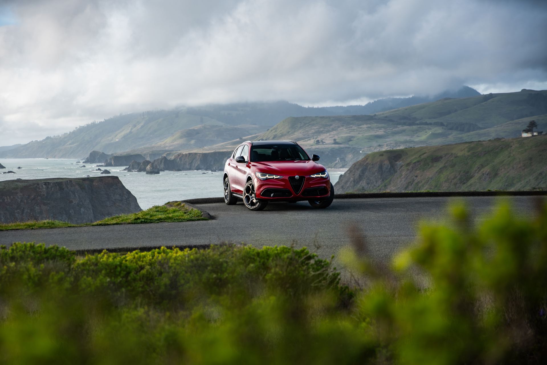 2026 alfa romeo stelvio front coastal road red