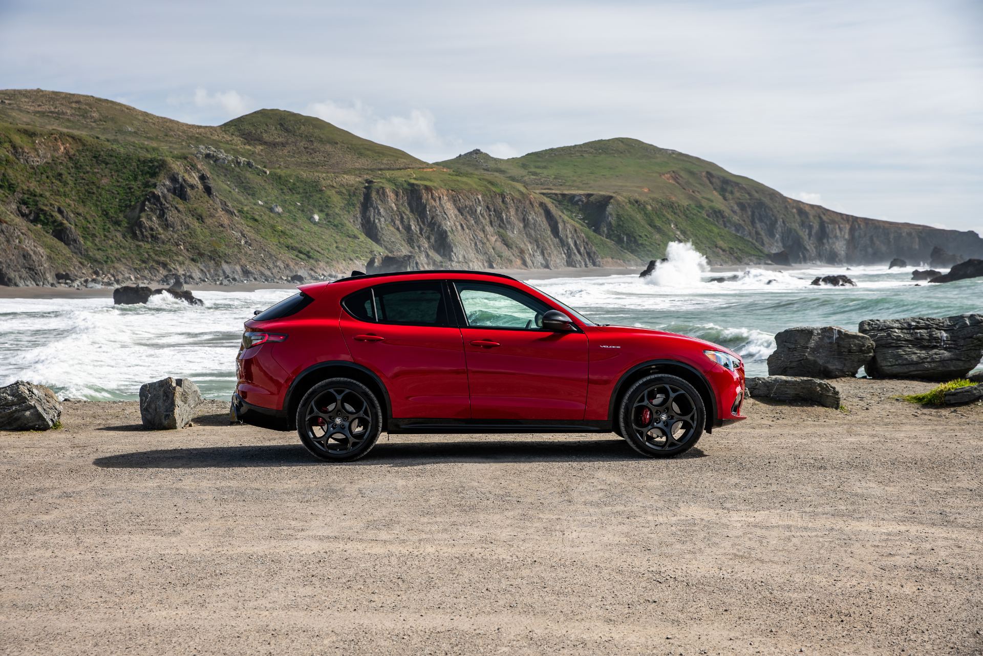 2026 alfa romeo stelvio side profile coast red