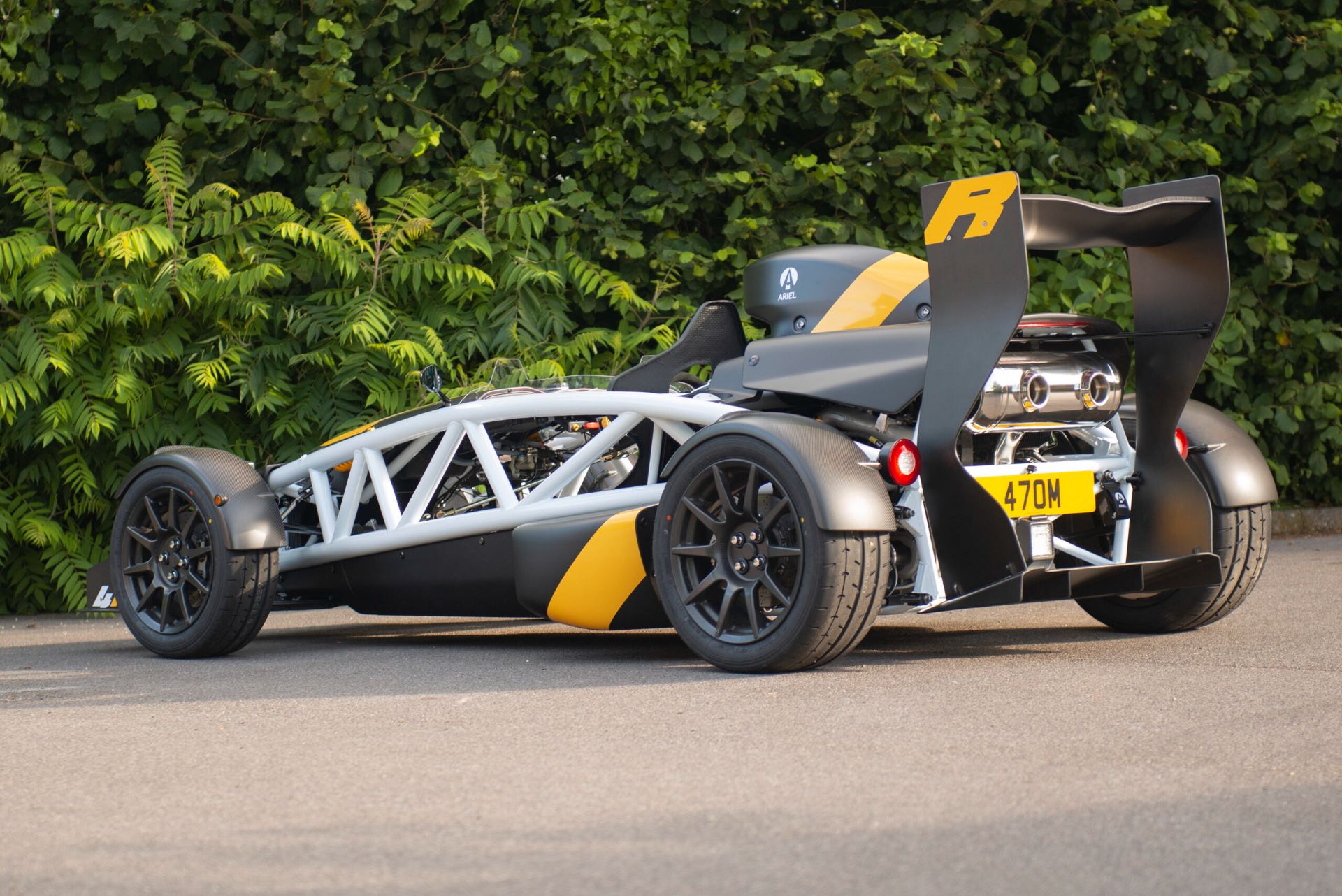 ariel atom 4r rear three quarter black and yellow