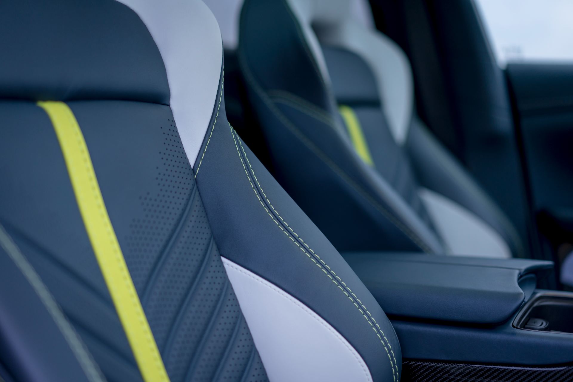 2026 aston martin dbx707 interior seat detail yellow stripe