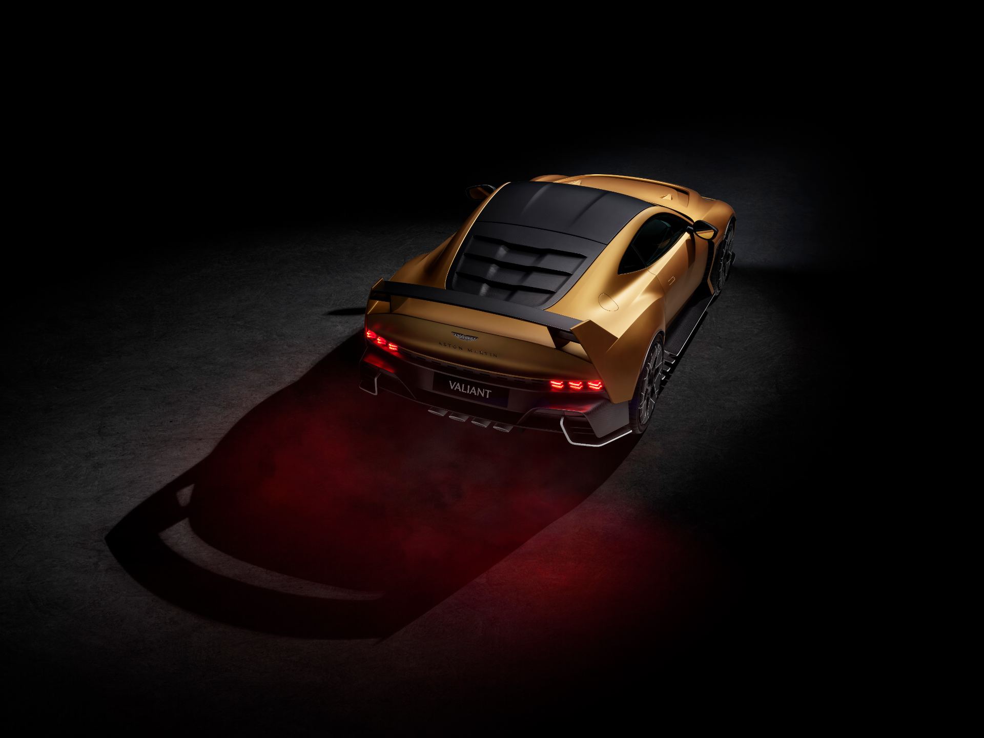 2026 aston martin valiant high angle rear three quarter gold