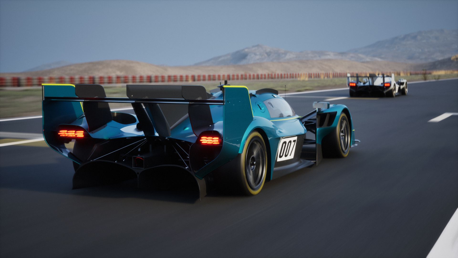 2026 aston martin valkyrie lm driving rear three quarter teal