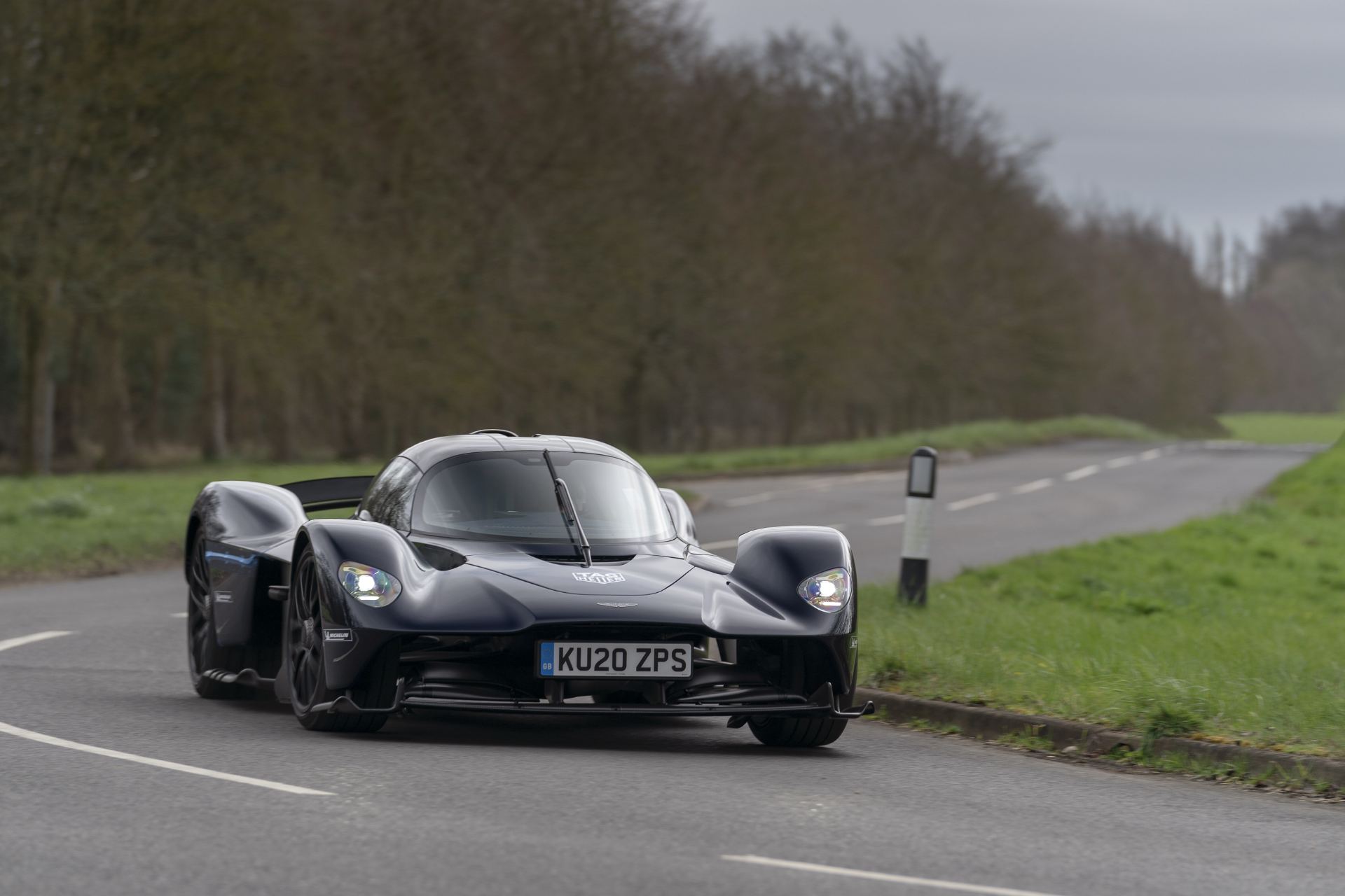 2026 aston martin valkyrie driving front bend dark blue
