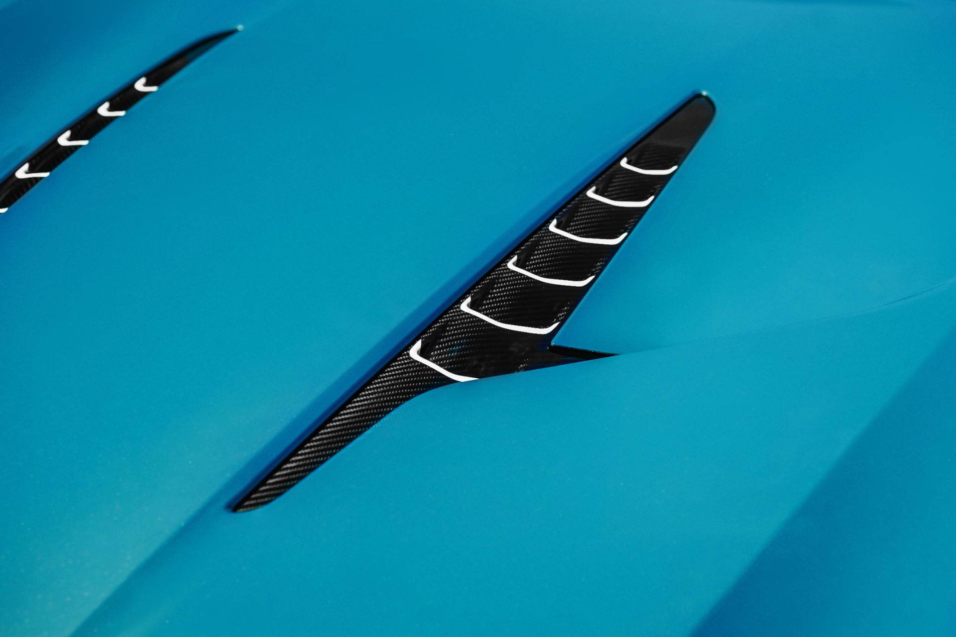 2026 aston martin vanquish volante wave edition side vent teal