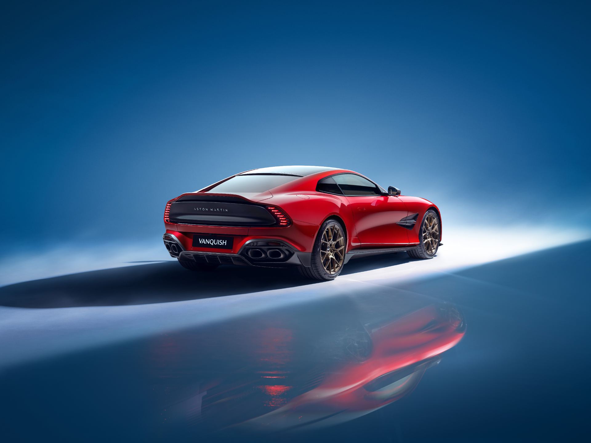 2026 aston martin vanquish rear three quarter studio red