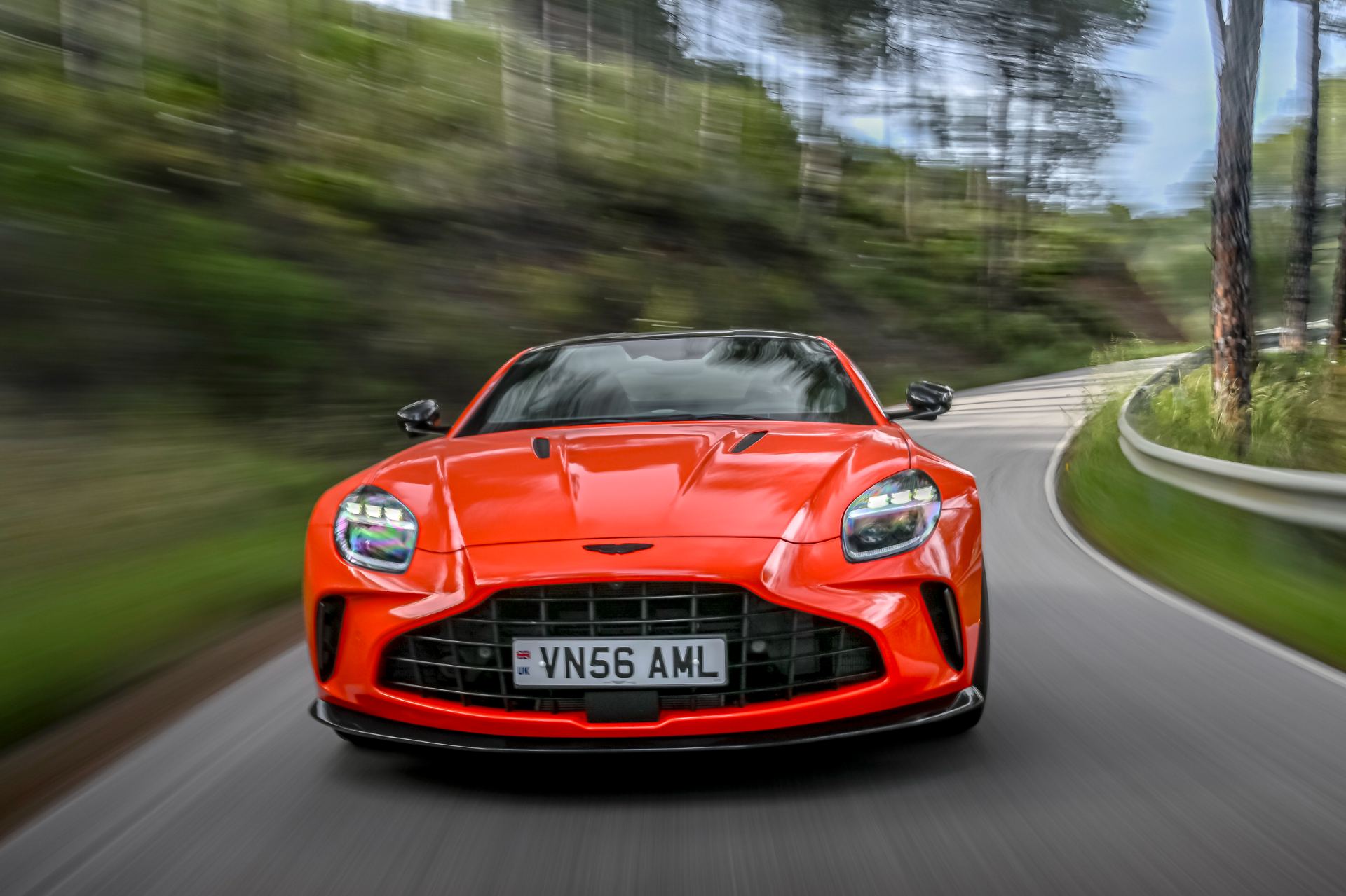 2026 aston martin vantage driving front cosmic orange