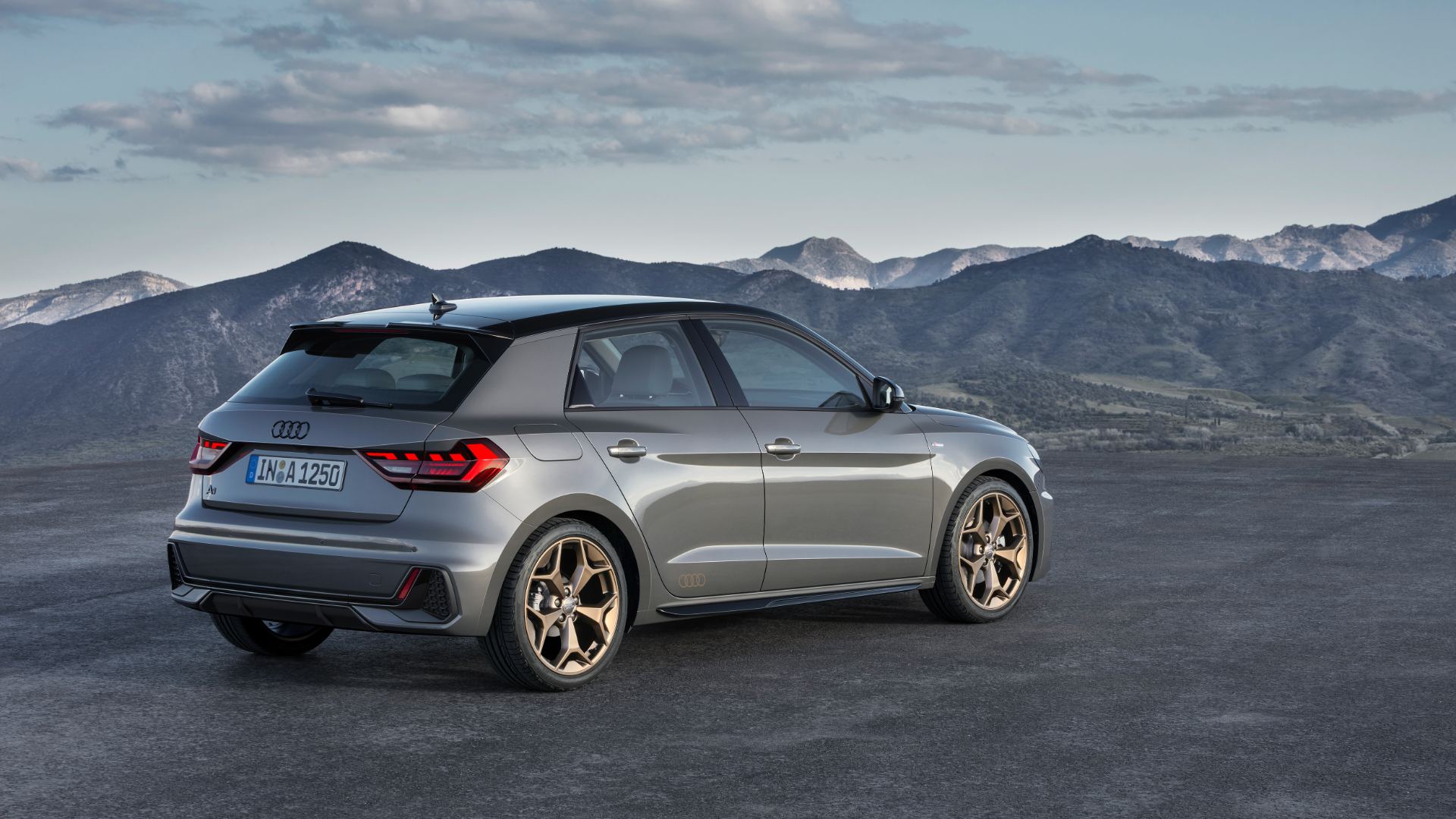 2026 audi a1 sportback rear three quarter mountains grey