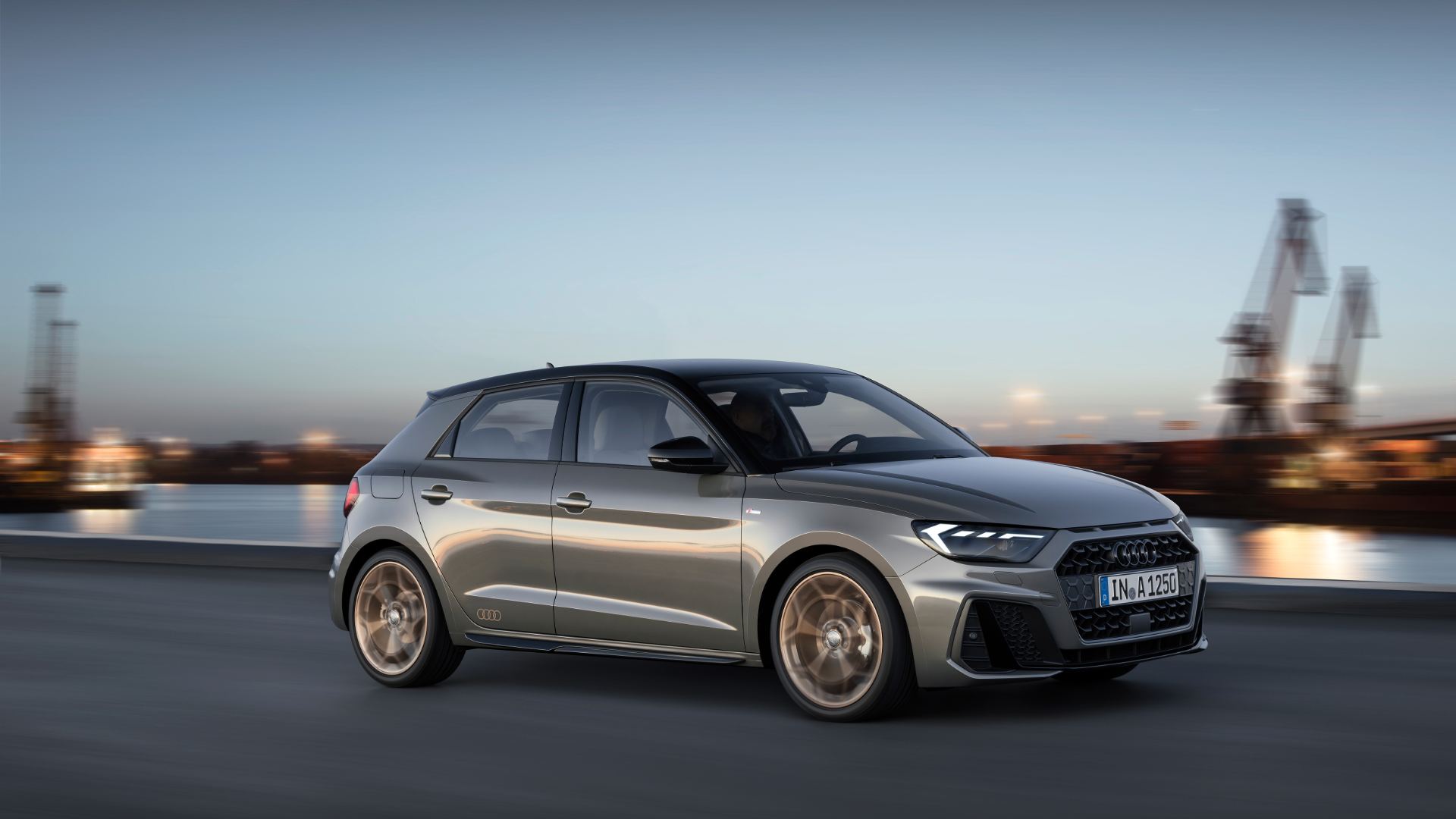 2026 audi a1 sportback driving front three quarter harbour grey