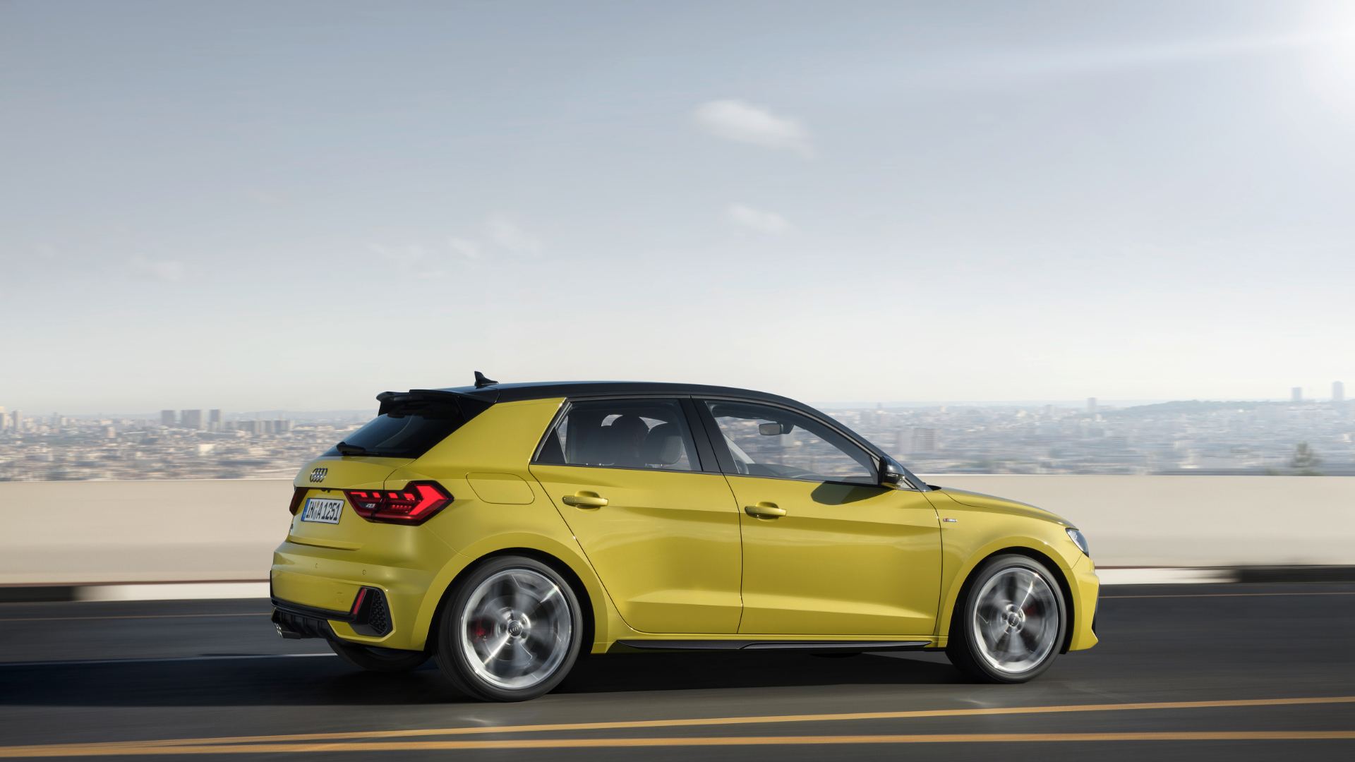 2026 audi a1 sportback driving side profile yellow