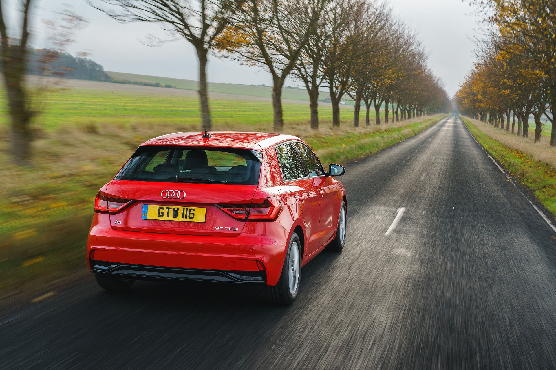 2026 audi a1 sportback sport driving rear avenue red