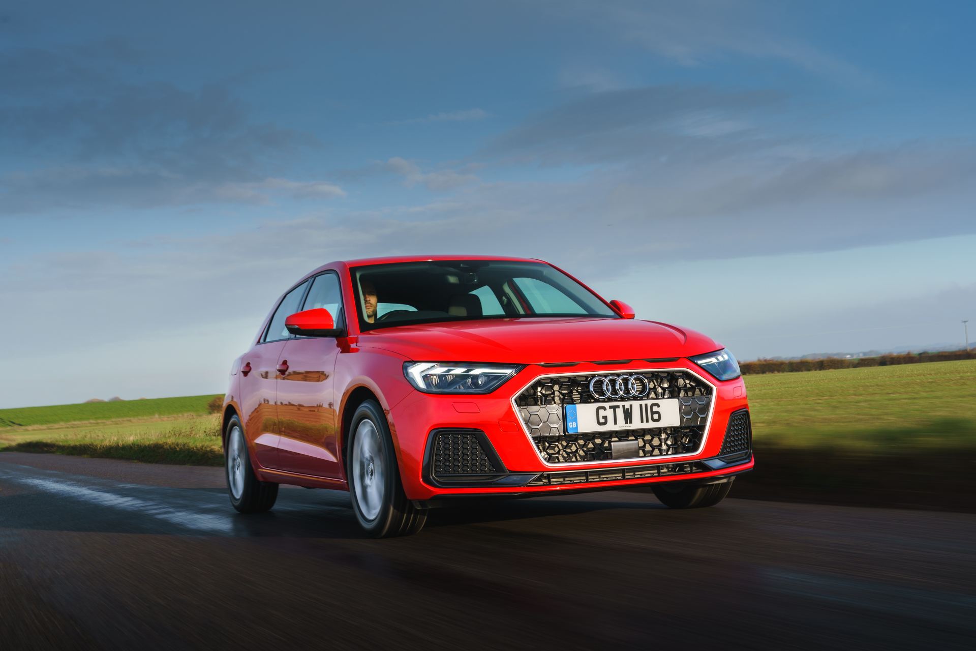 2026 audi a1 sportback sport driving front three quarter red