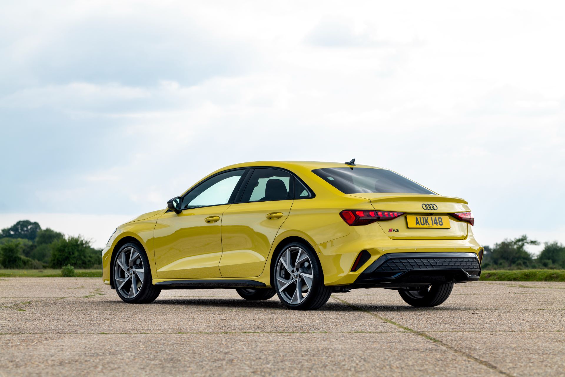 2025 audi a3 saloon rear three quarter airfield yellow
