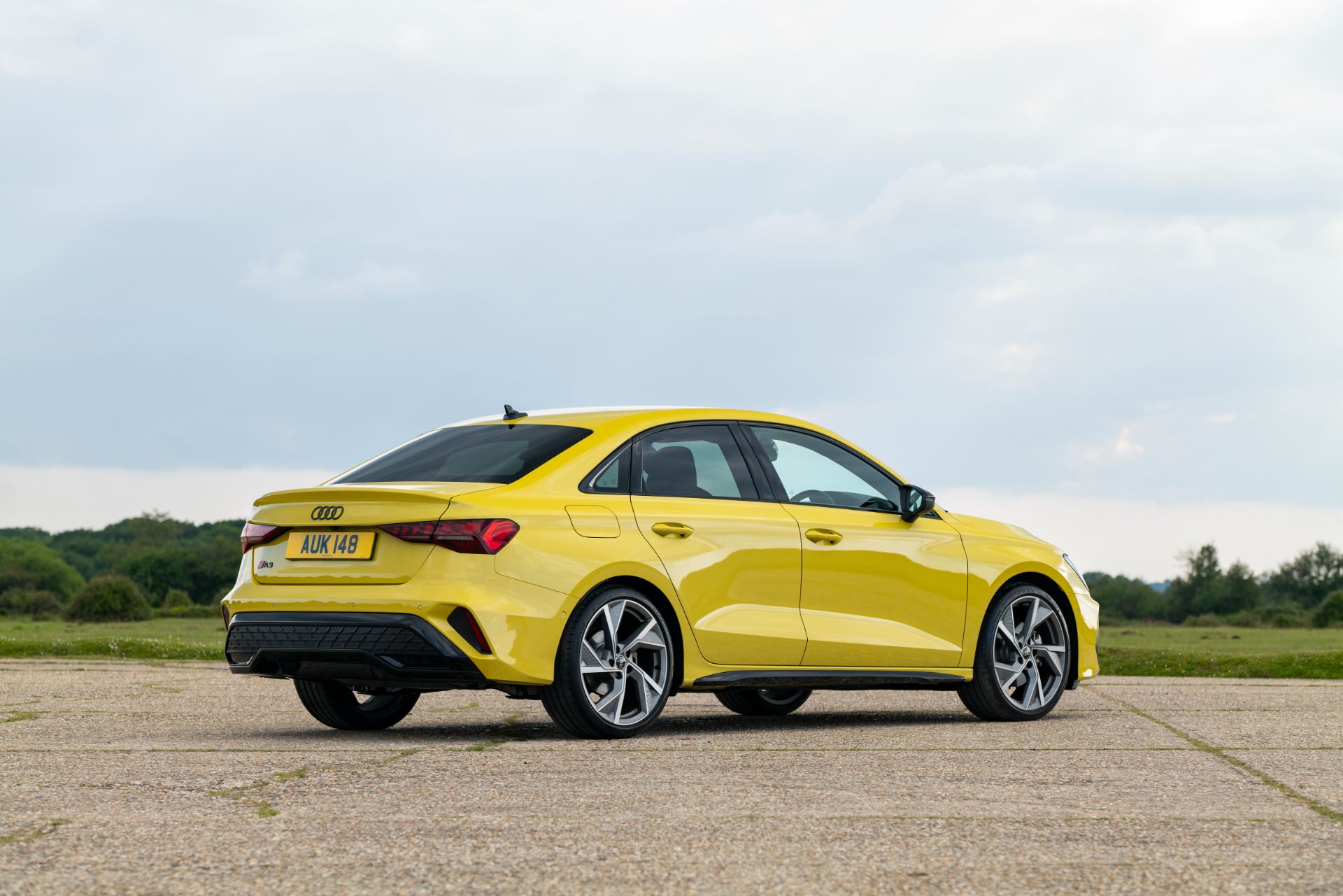 2025 audi a3 saloon rear three quarter driver side yellow