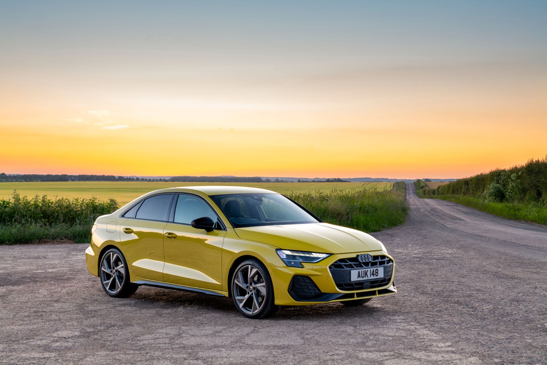 2025 audi a3 saloon front three quarter sunset yellow