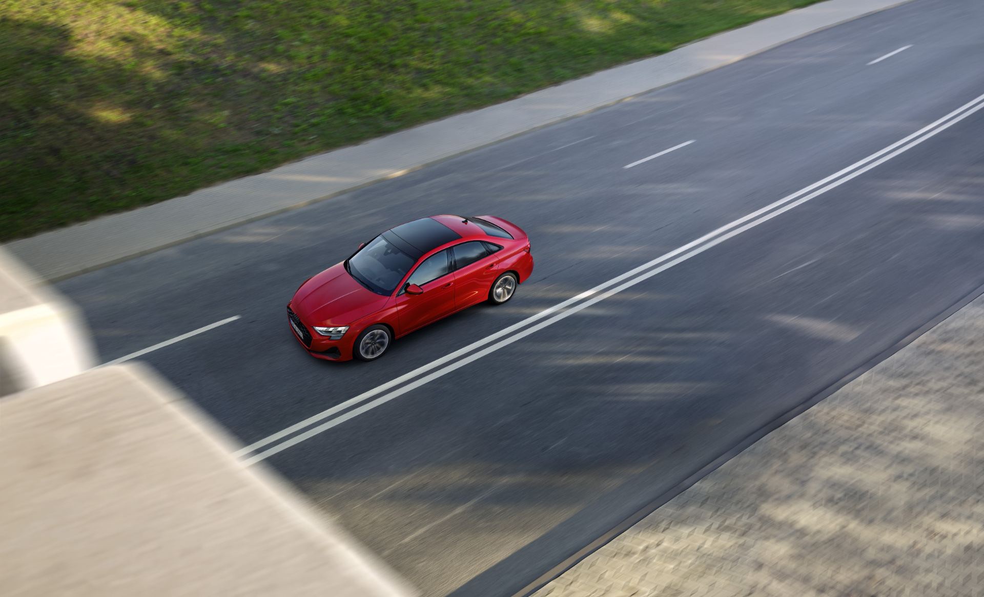 2025 audi a3 saloon driving overhead red