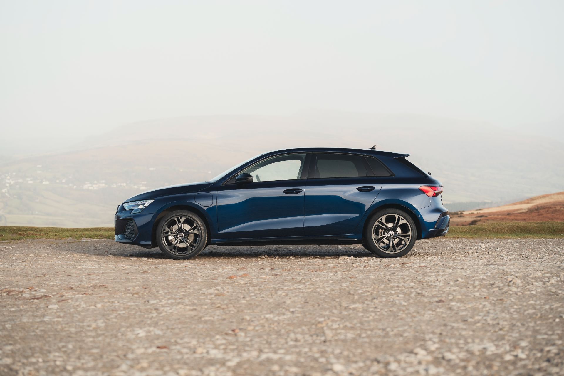 2025 audi a3 sportback tfsi e side profile blue