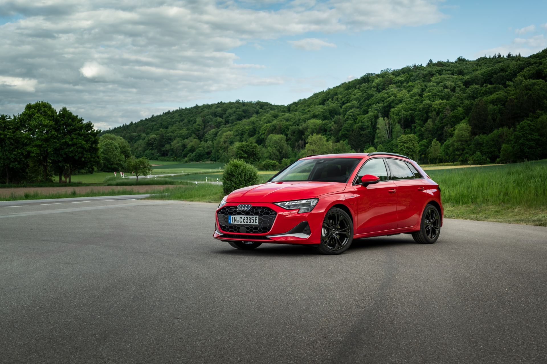 2027 audi a3 sportback e hybrid front three quarter red