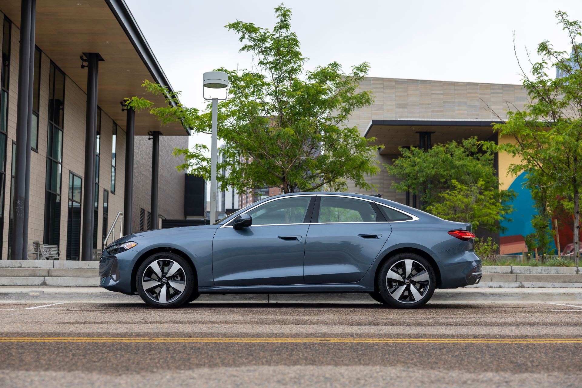 2026 audi a5 side profile street blue grey
