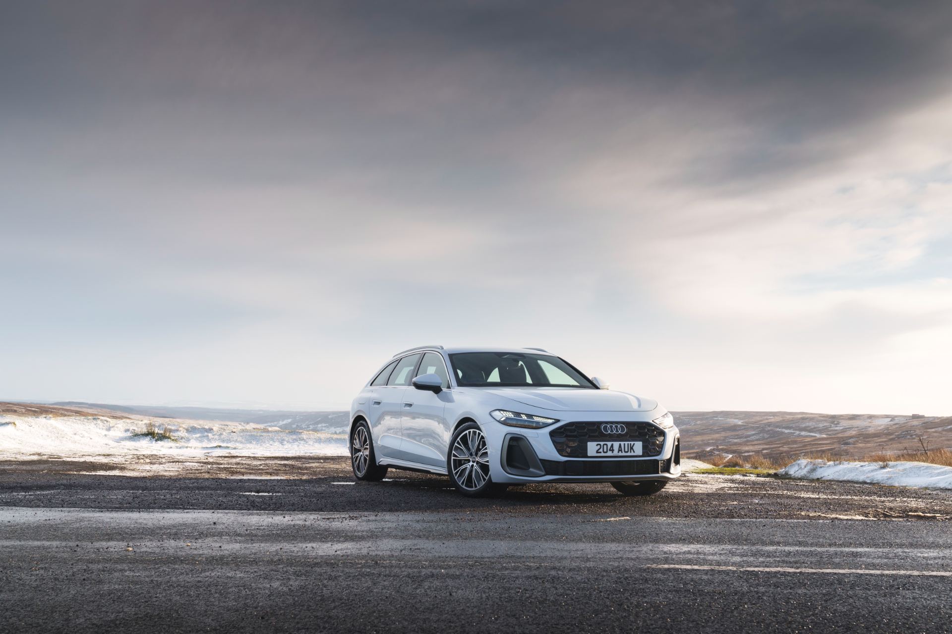 audi a5 avant front distant moorland white