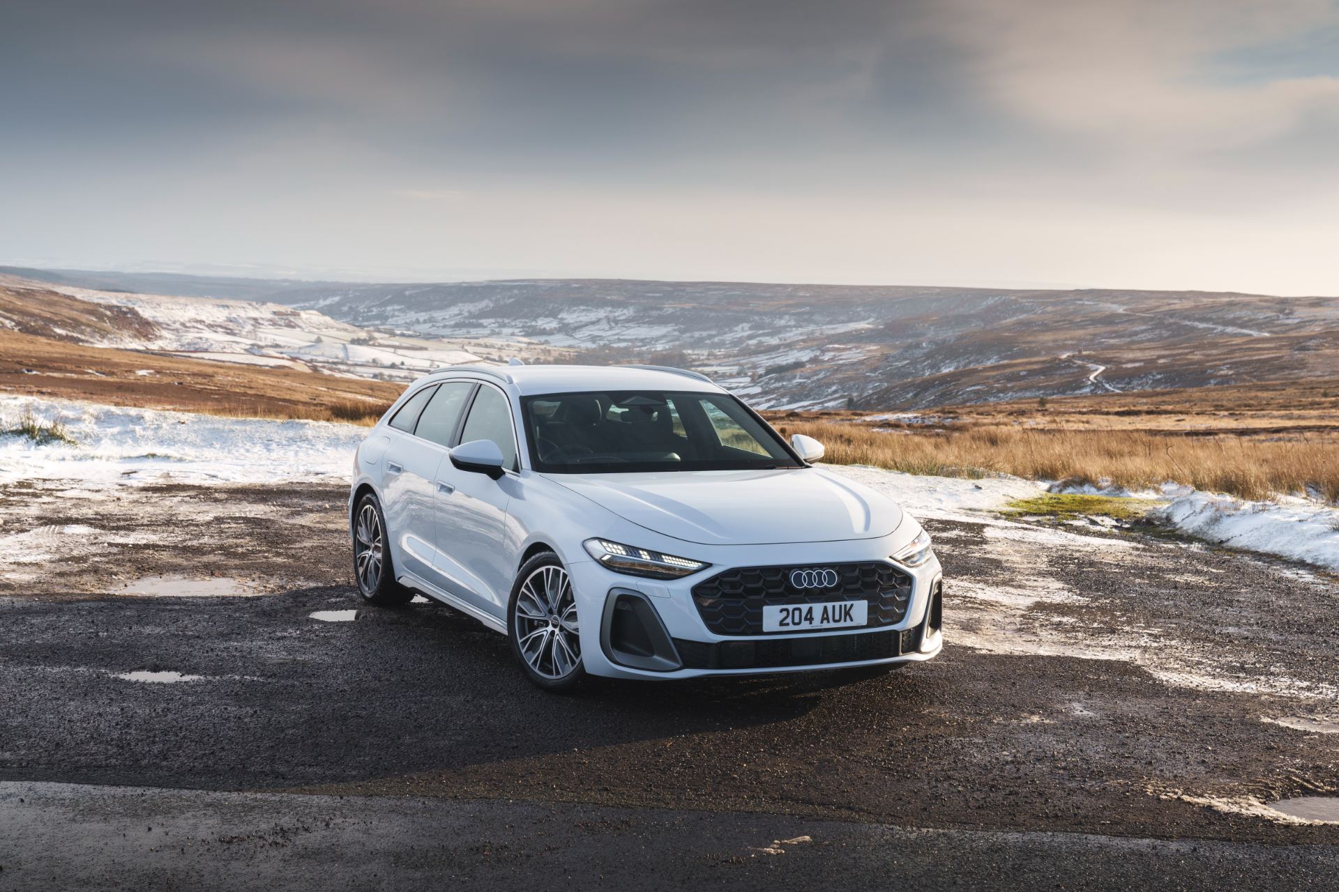 audi a5 avant front three quarter moorland white
