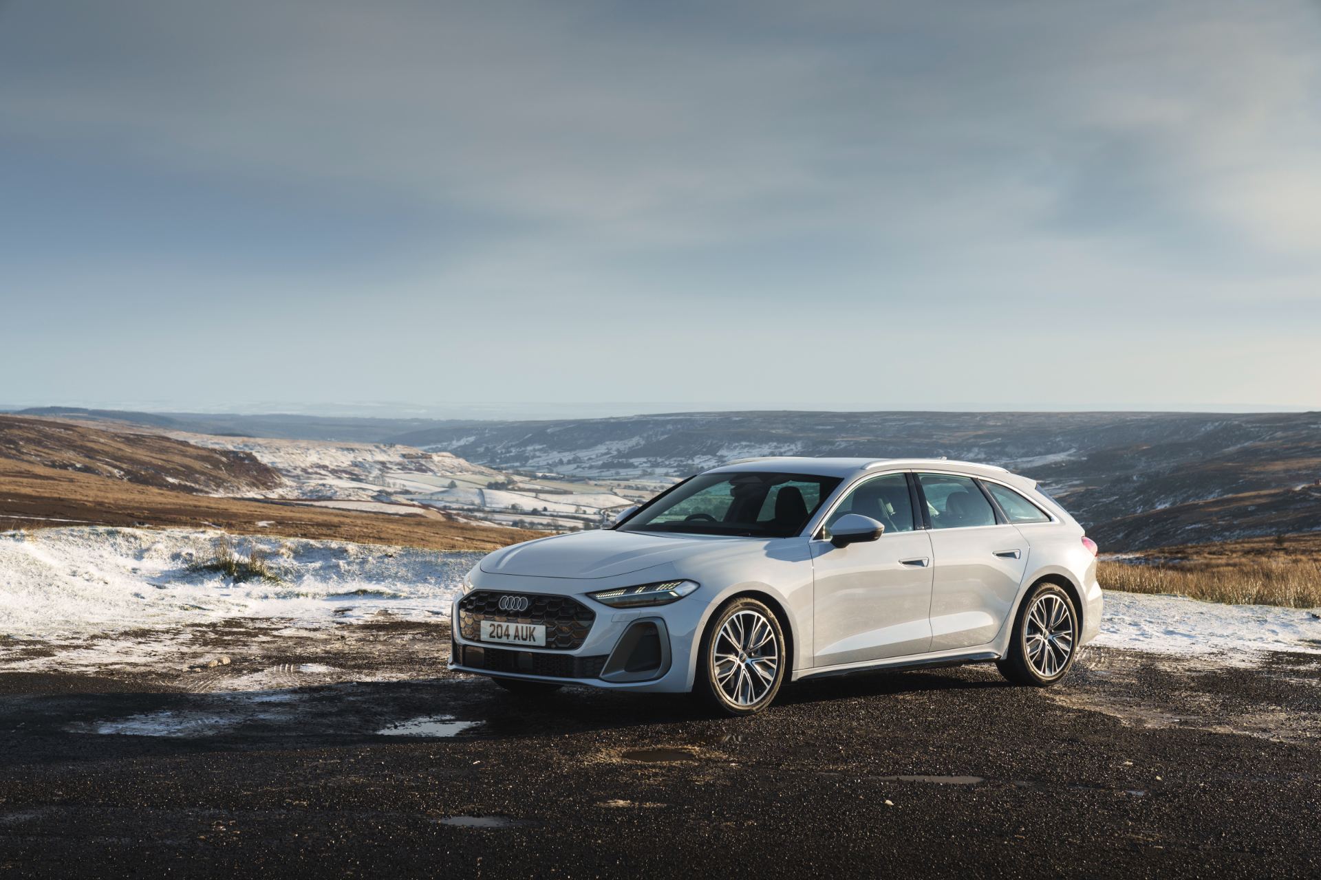 audi a5 avant front three quarter valley white