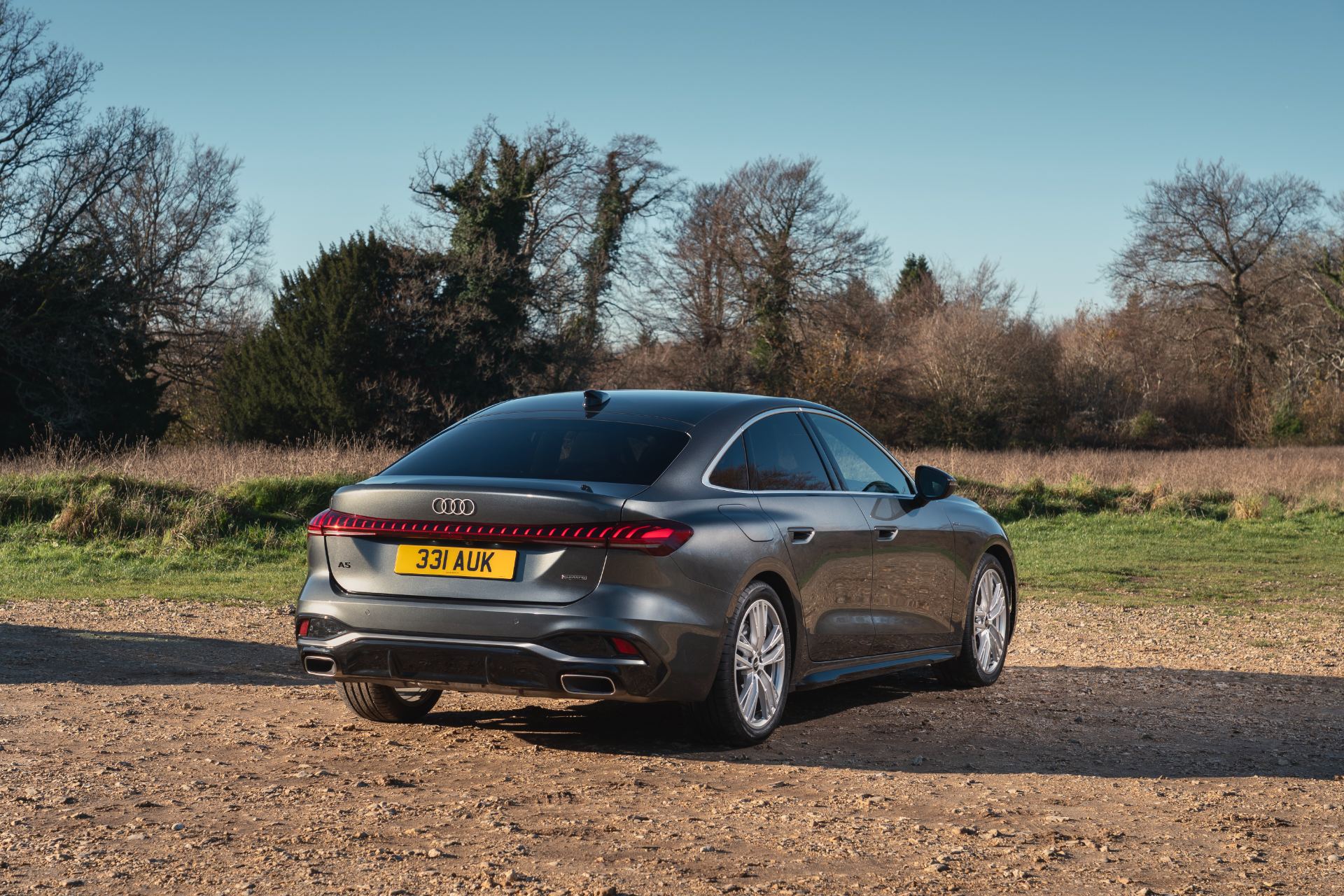 2026 audi a5 saloon rear three quarter heath grey