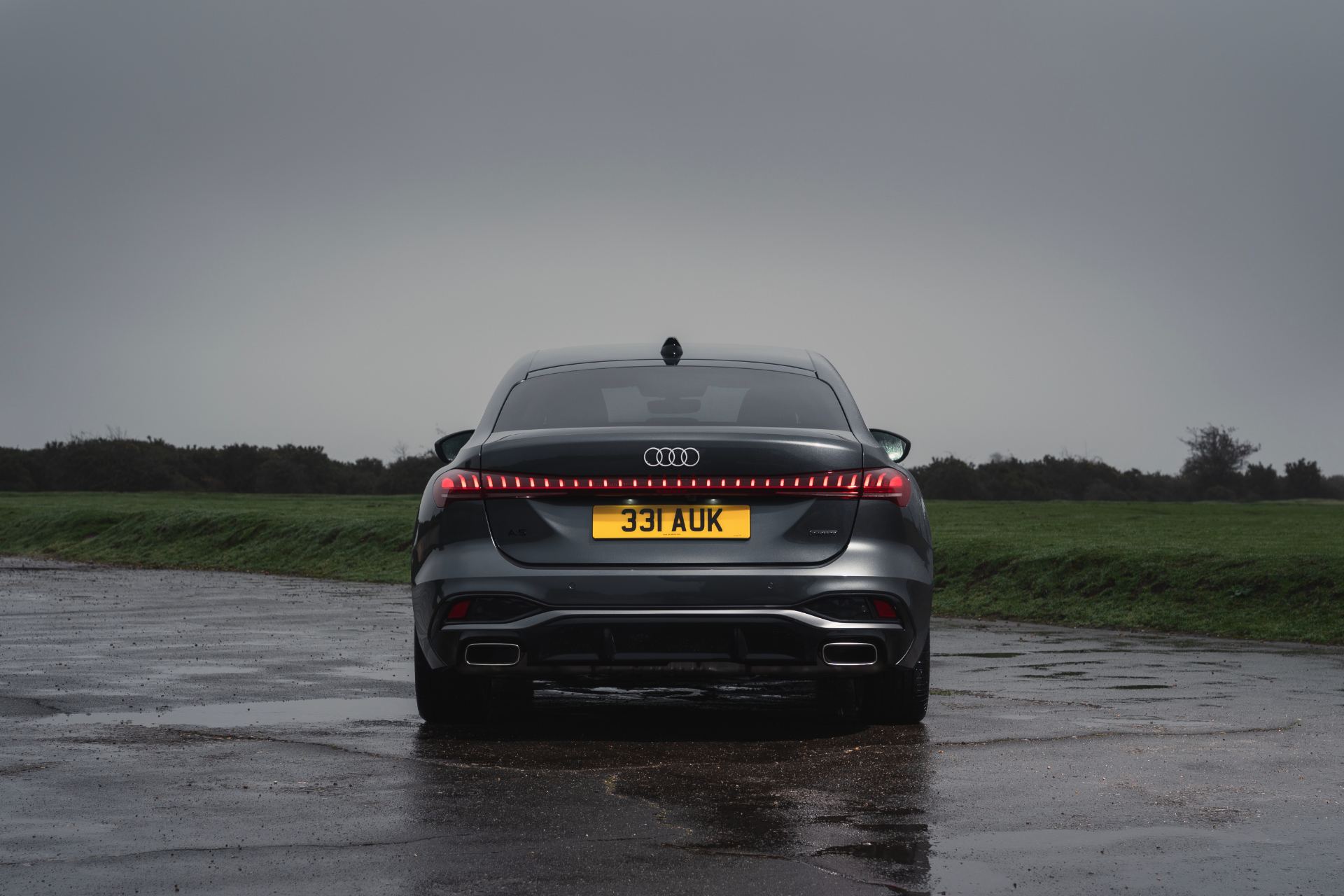 2026 audi a5 saloon e hybrid rear wet airfield grey