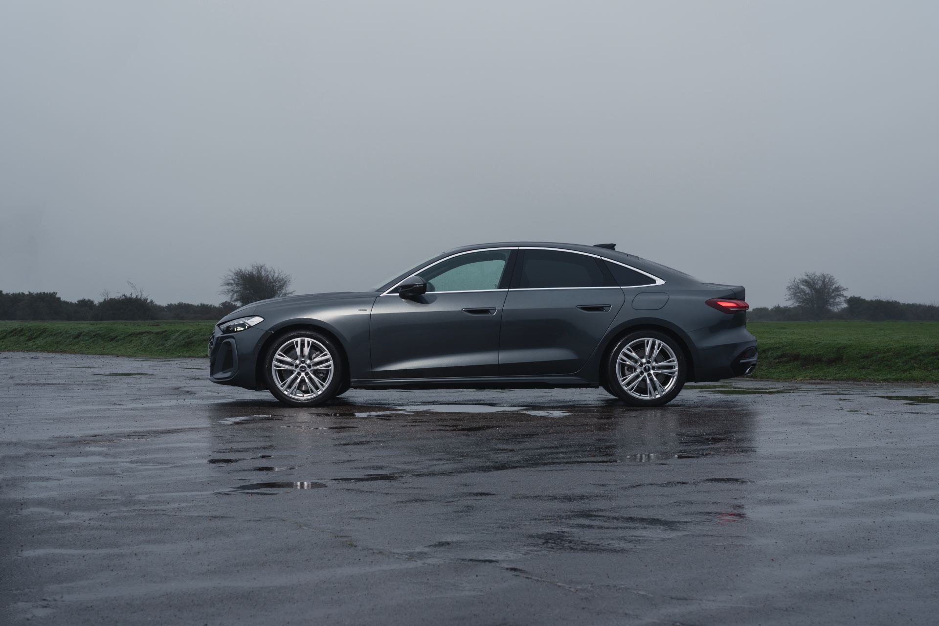 2026 audi a5 saloon e hybrid side profile wet airfield grey