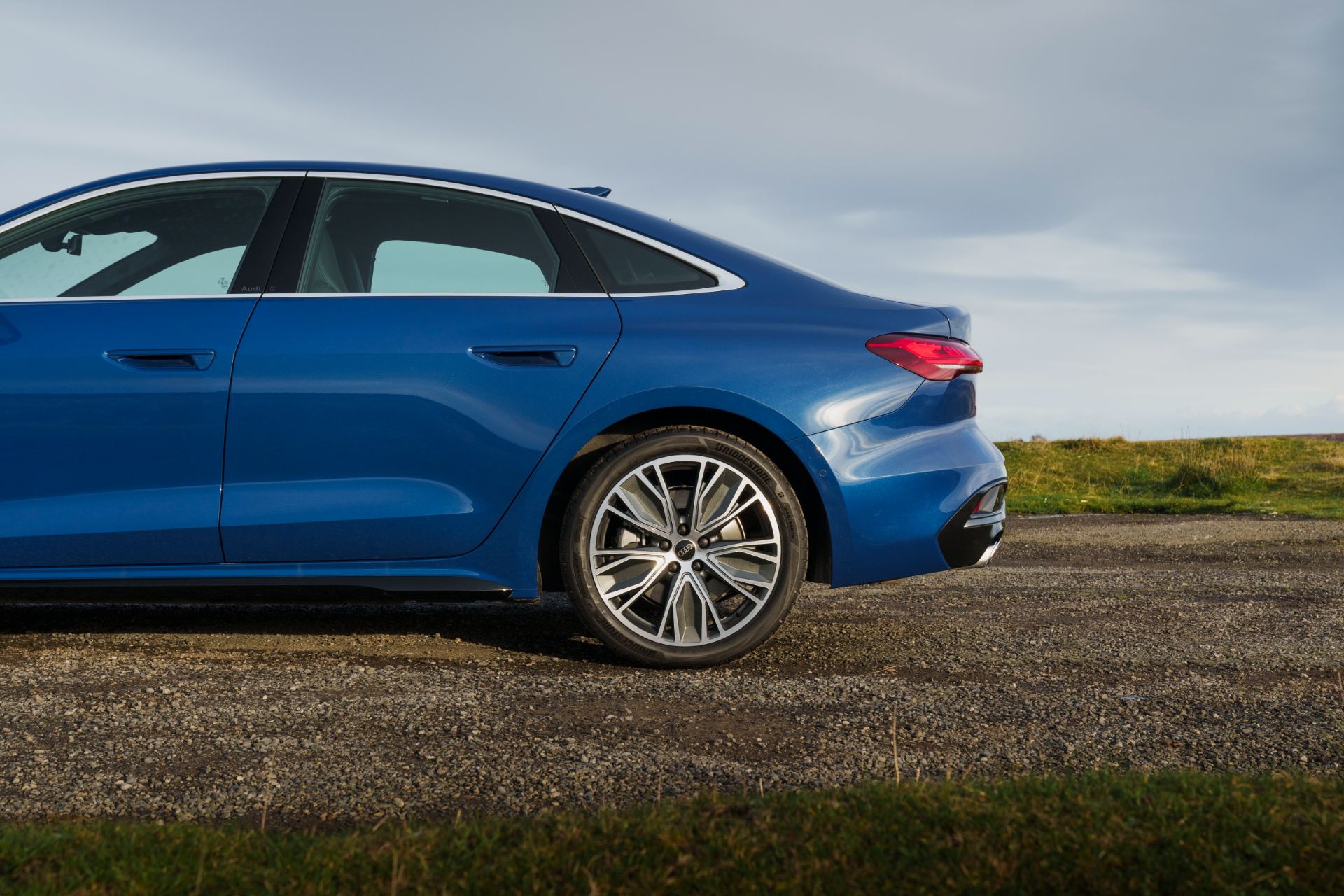 audi a5 saloon side detail wheel blue