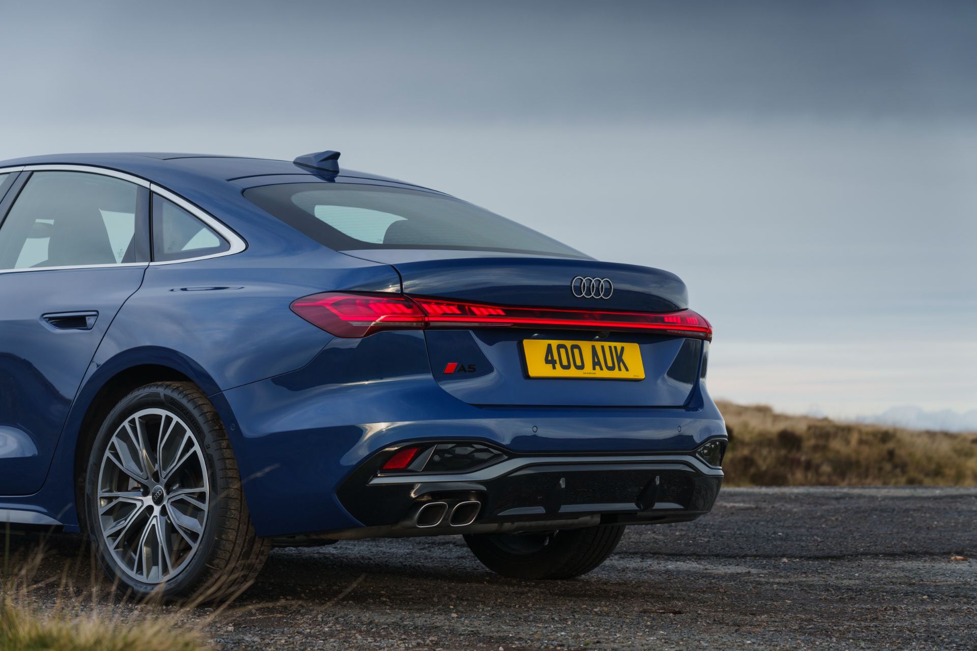 audi a5 saloon rear three quarter close blue