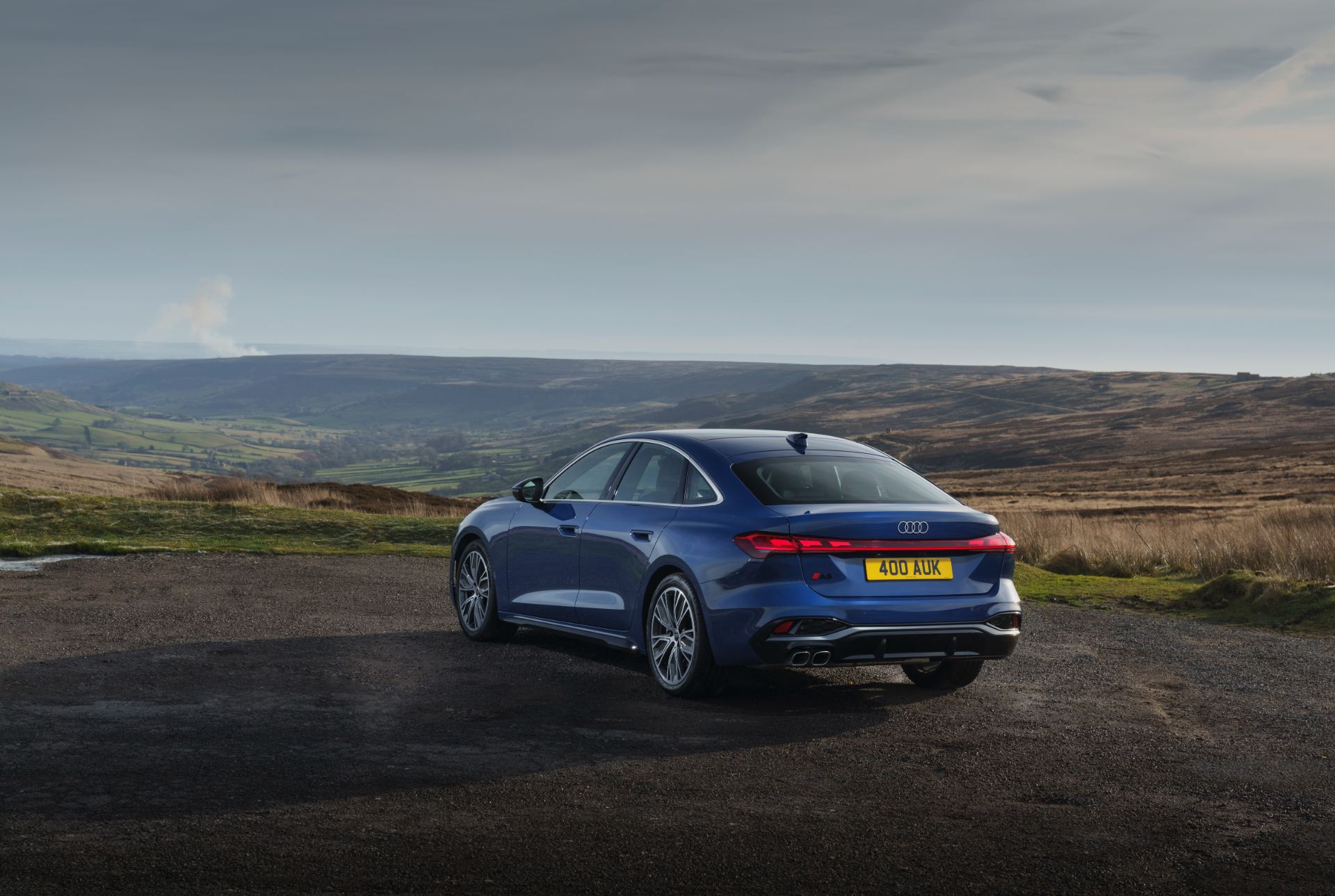 audi a5 saloon rear three quarter moorland blue