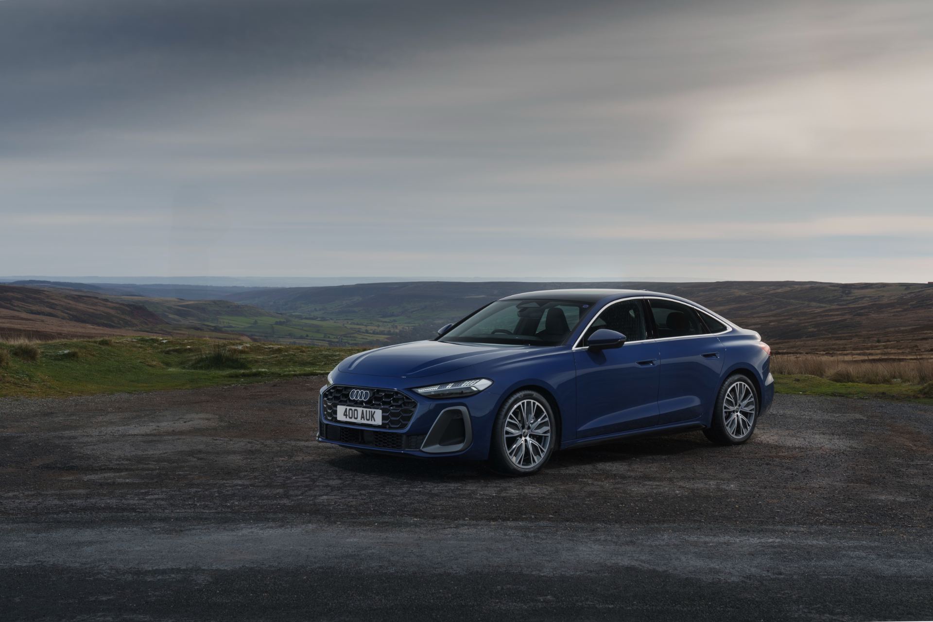 audi a5 saloon front three quarter moorland blue