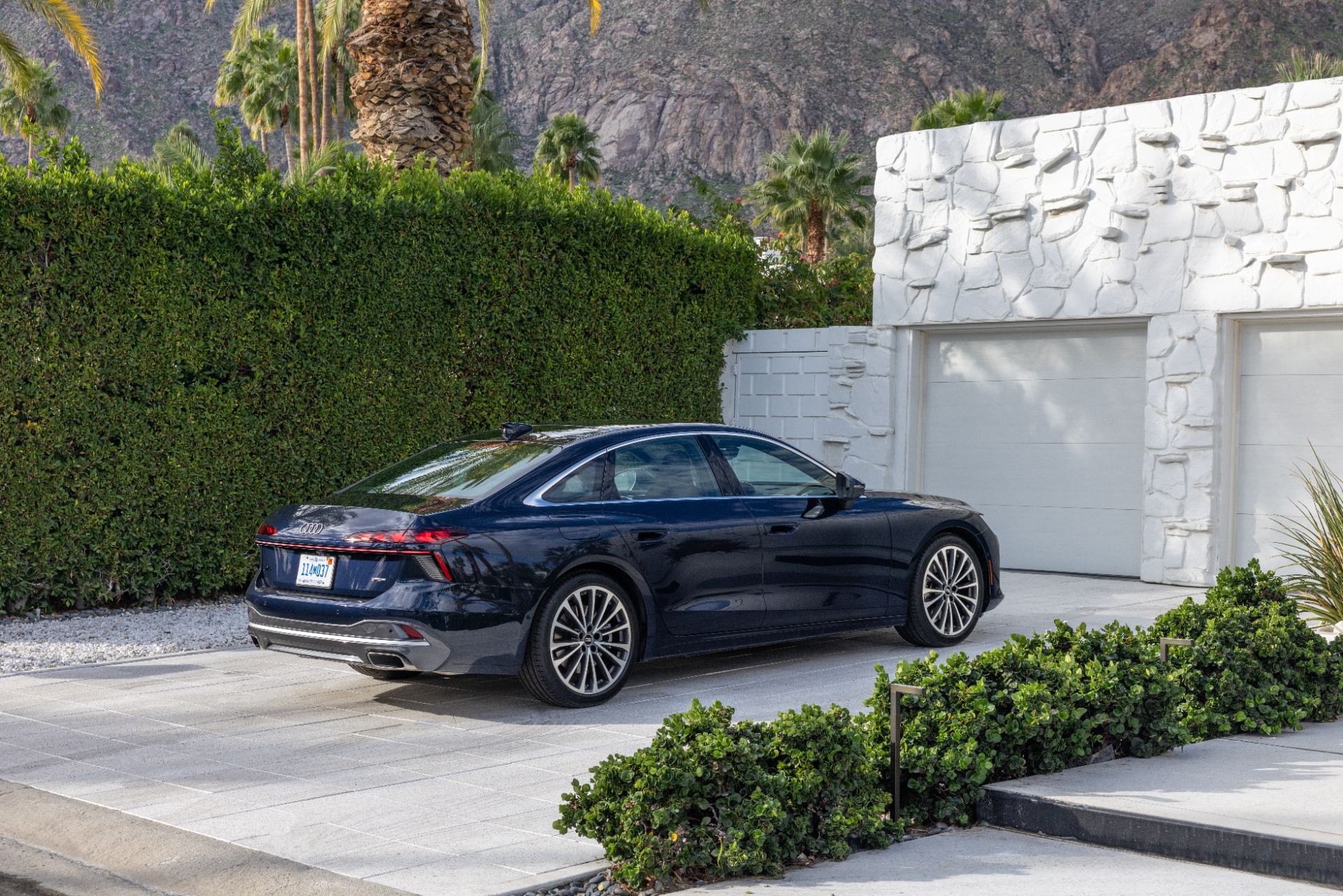 2026 audi a6 rear three quarter driveway dark blue