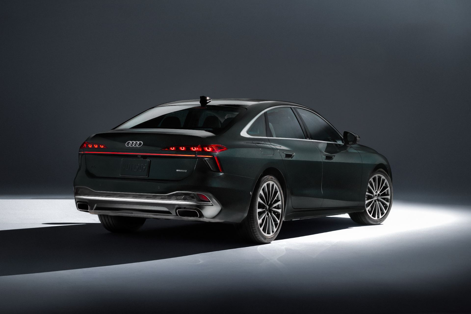 2026 audi a6 rear three quarter studio midnight green