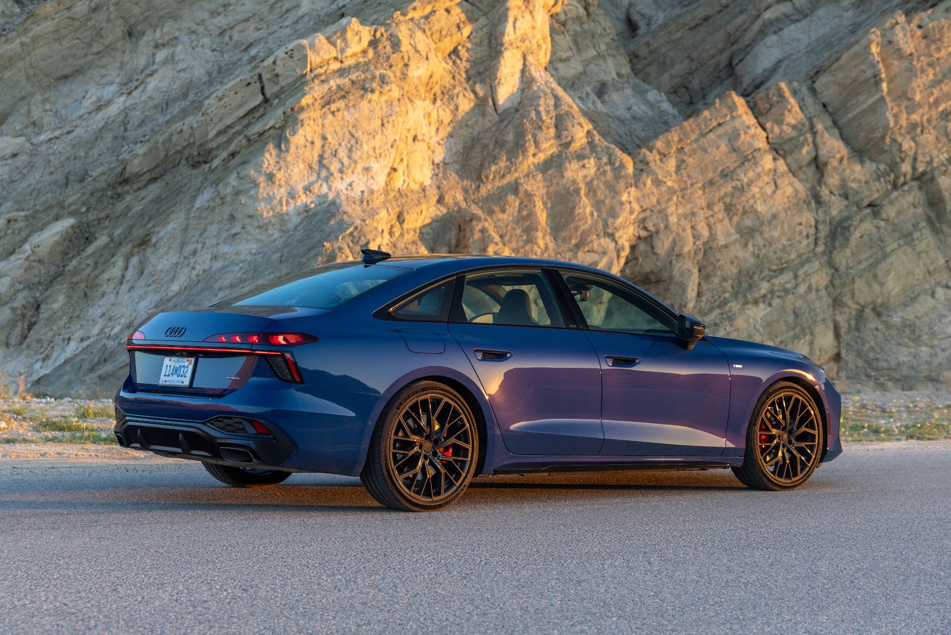 2026 audi a6 rear three quarter canyon blue