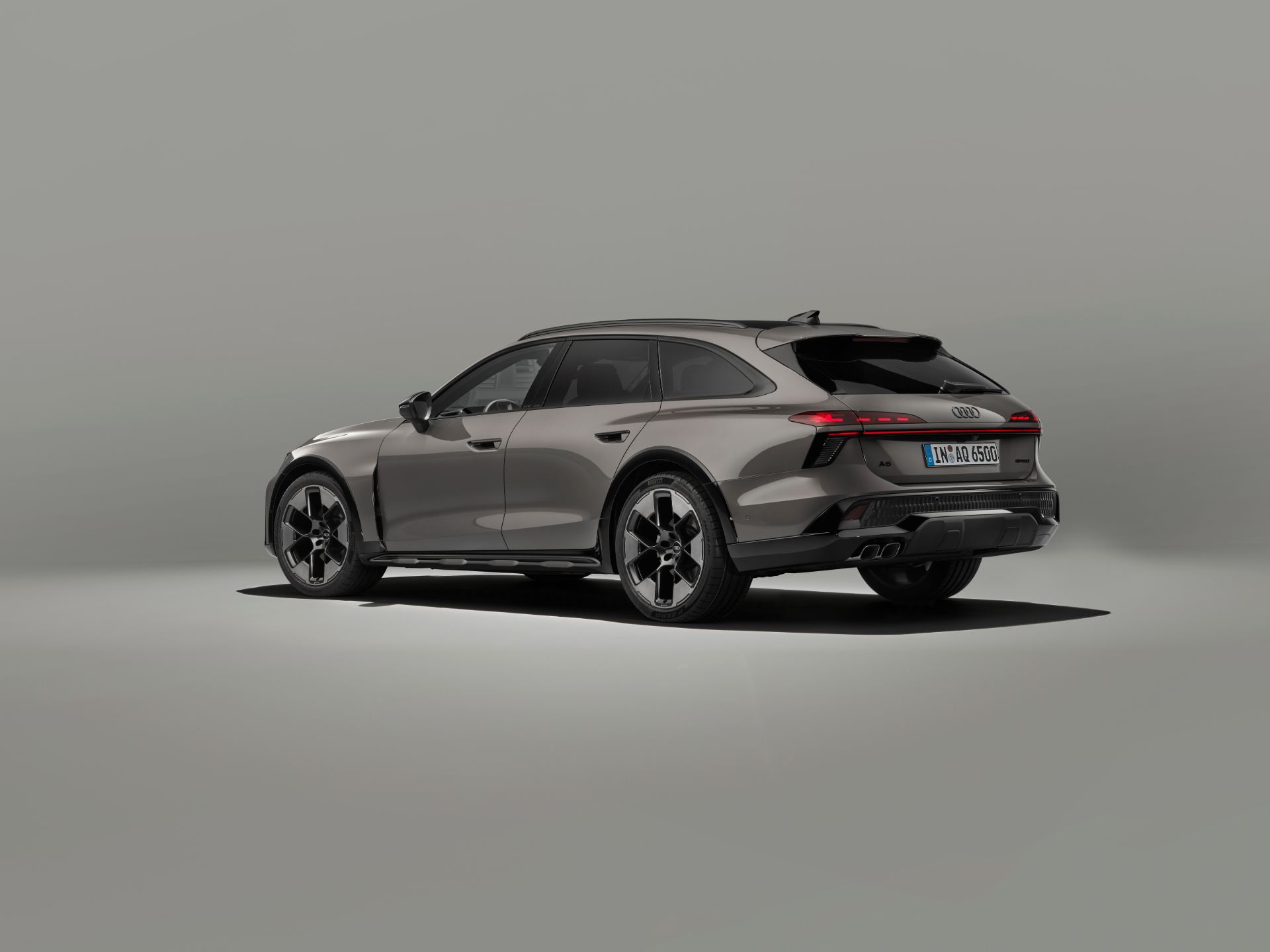 2026 audi a6 allroad rear three quarter distant studio grey