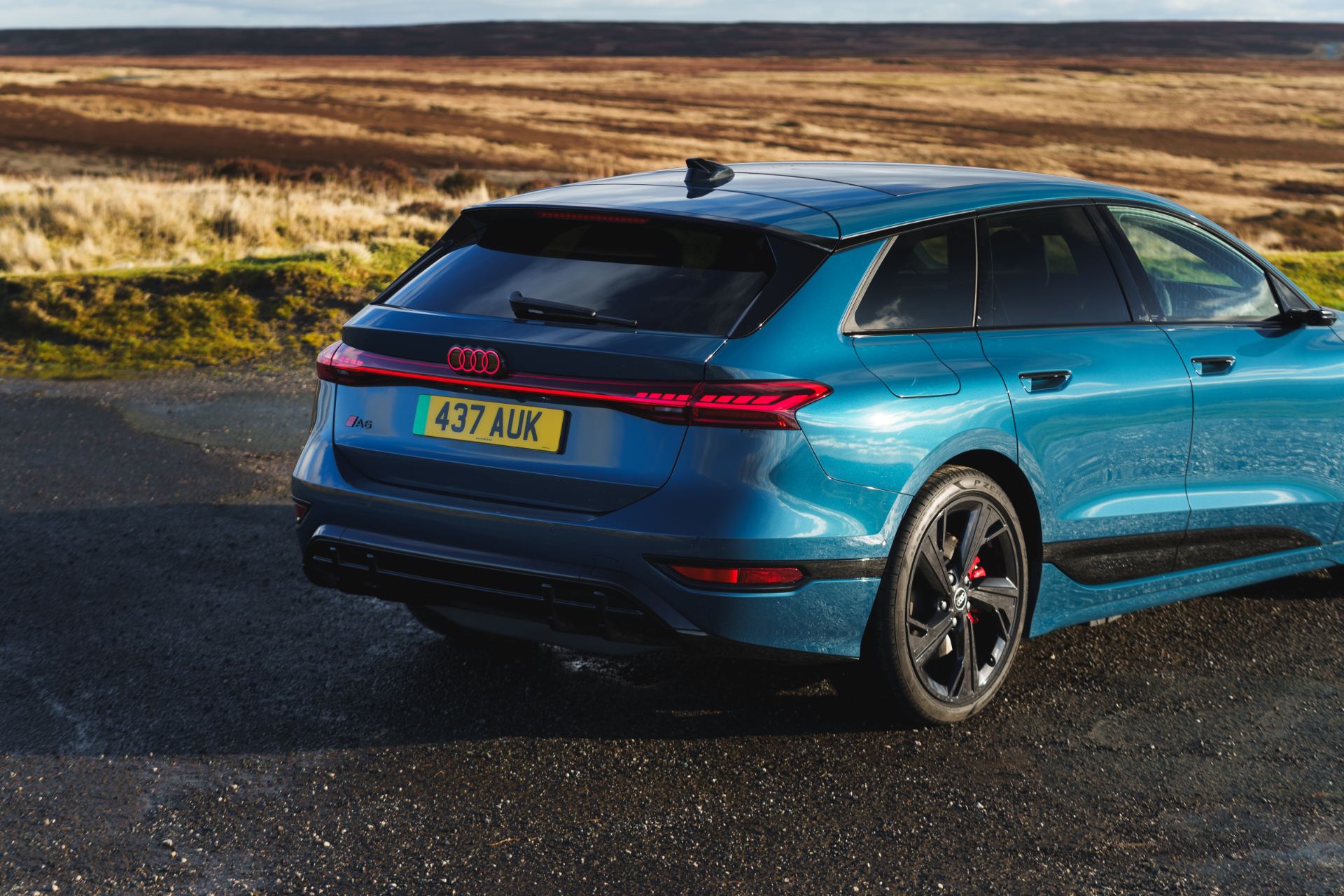 2026 audi a6 avant e tron rear three quarter moorland blue