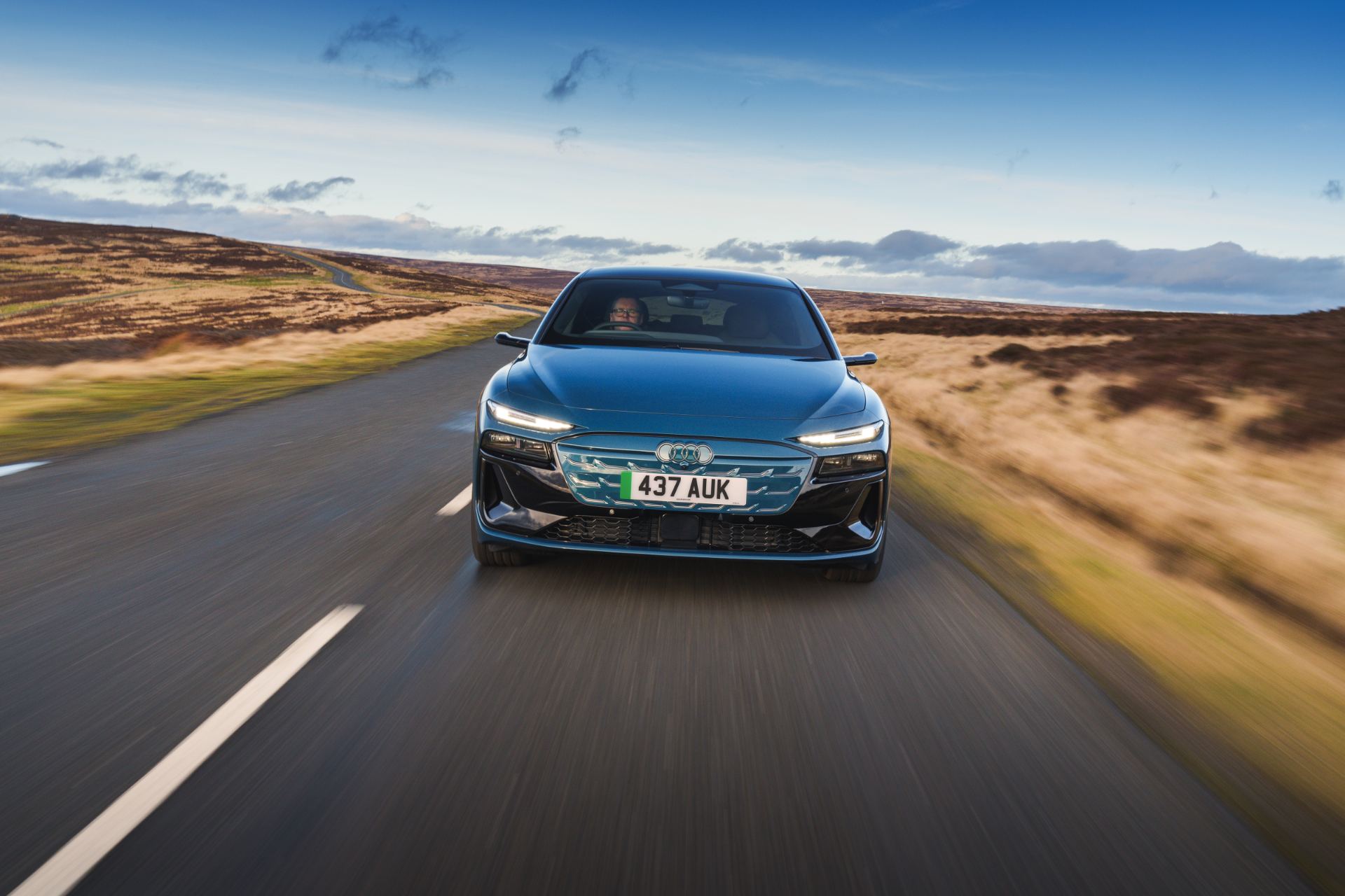 2026 audi a6 avant e tron driving front blue