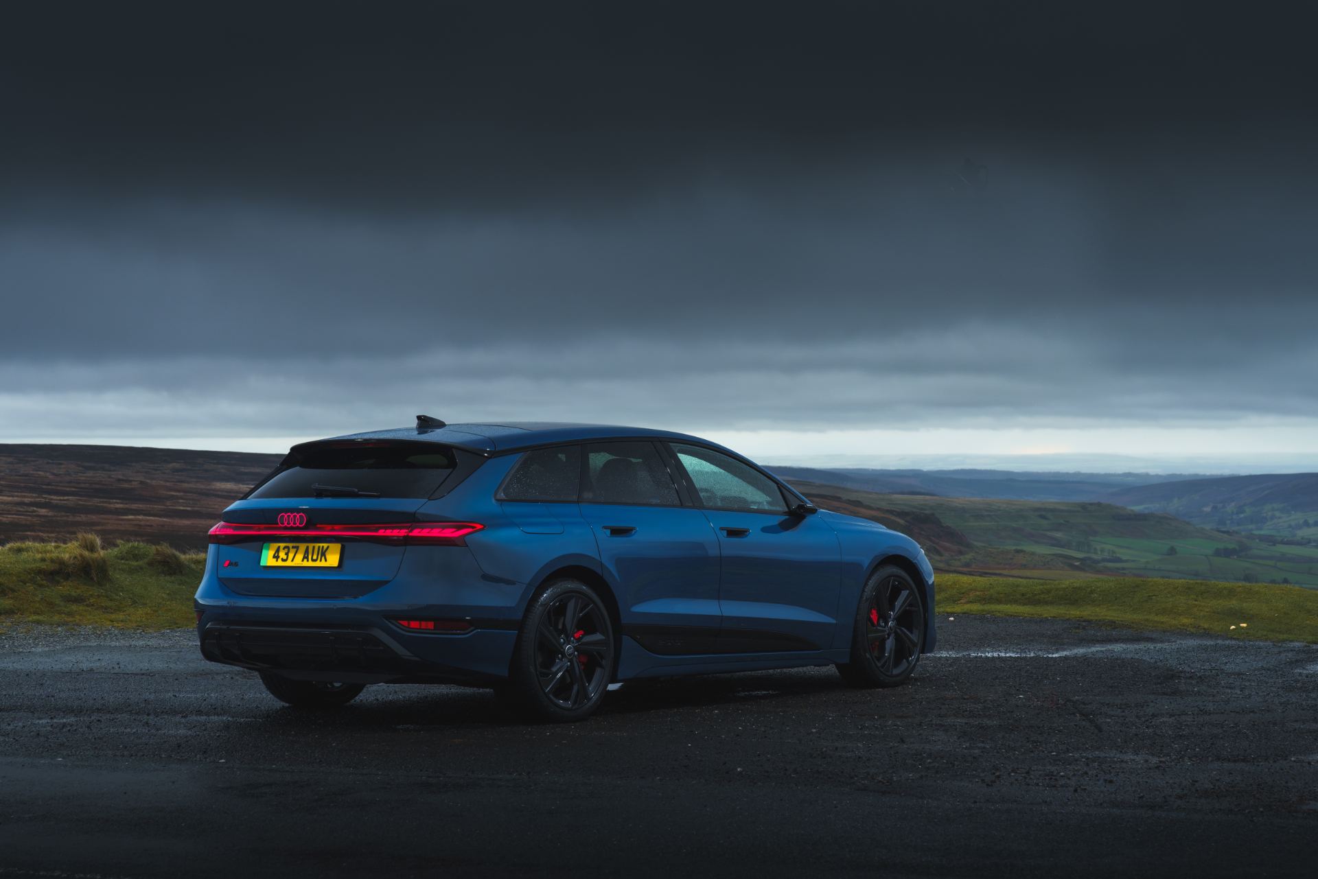 2026 audi a6 avant e tron rear three quarter valley blue