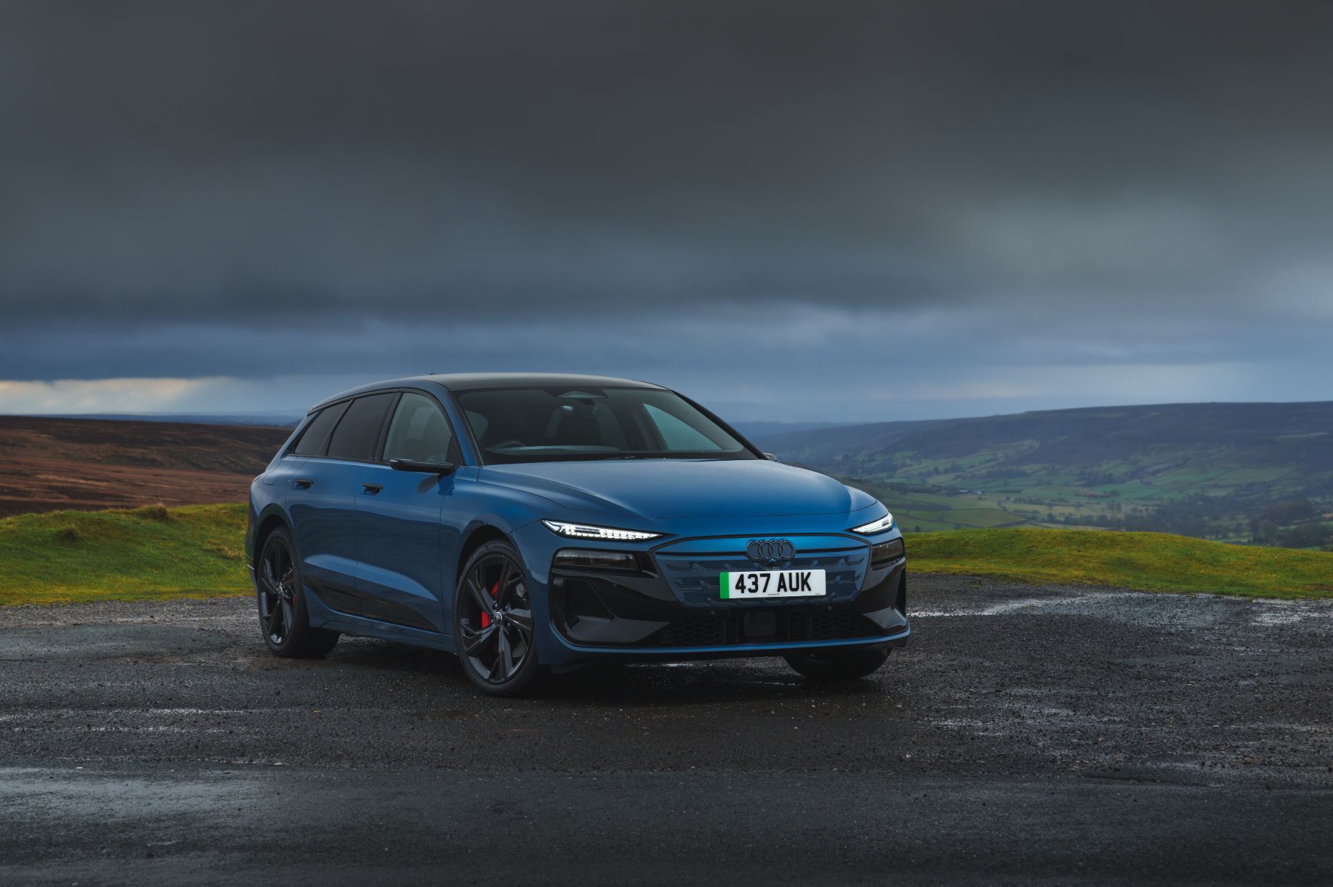 2026 audi a6 avant e tron front three quarter blue