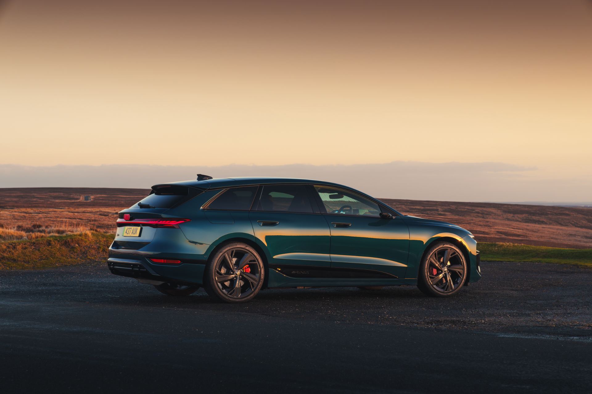 2026 audi a6 avant e tron side profile sunset blue